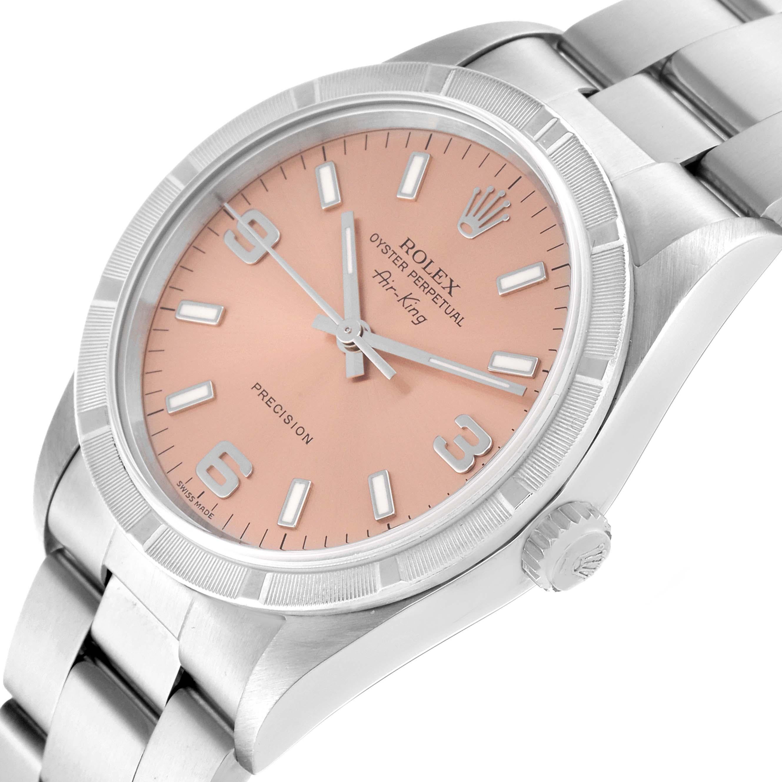 Rolex Air King 34 Salmon Dial Engine Turned Bezel Steel Mens Watch 14010. Automatic self-winding movement. Stainless steel case 34 mm in diameter. Rolex logo on the crown. Stainless steel engine turned bezel. Scratch resistant sapphire crystal.