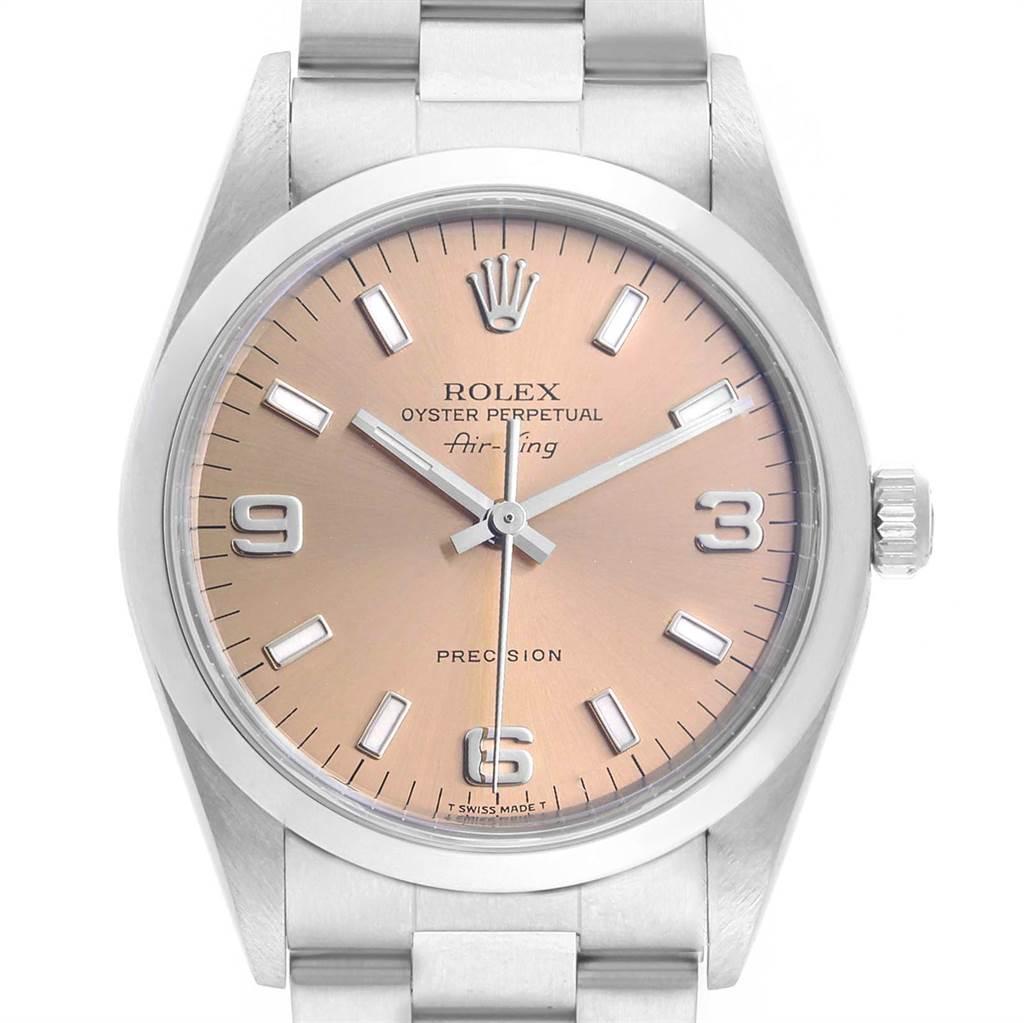 Rolex Air King 34 Salmon Dial Smooth Bezel Steel Unisex Watch 14000. Automatic self-winding movement. Stainless steel case 34 mm in diameter. Rolex logo on a crown. Stainless steel smooth domed bezel. Scratch resistant sapphire crystal. Salmon dial
