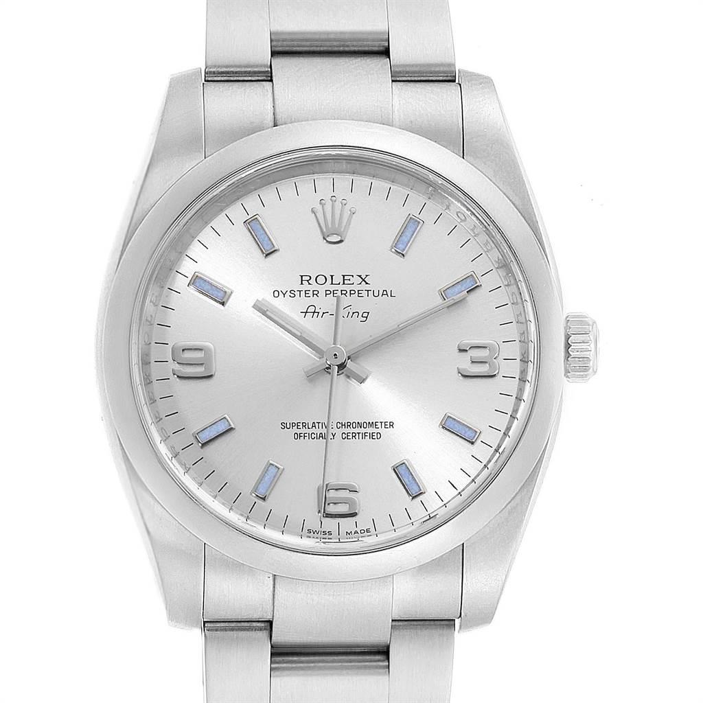 Rolex Air King 34 Silver Dial Blue Baton Hour Markers Steel Watch 114200. Officially certified chronometer self-winding movement. Stainless steel case 34.0 mm in diameter. Rolex logo on a crown. Stainless steel smooth domed bezel. Scratch resistant