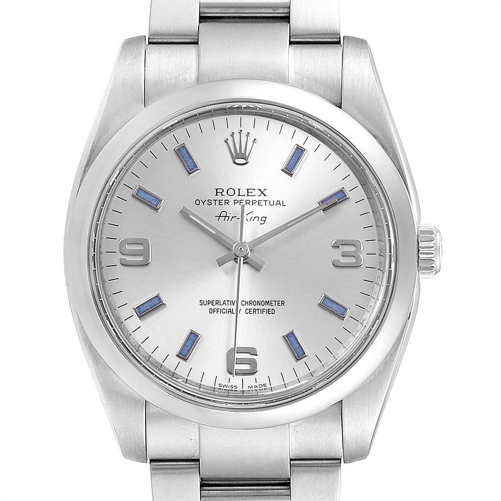 Rolex Air King 34 Silver Dial Blue Baton Hour Markers Steel Watch 114200. Officially certified chronometer self-winding movement. Stainless steel case 34.0 mm in diameter. Rolex logo on a crown. Stainless steel smooth domed bezel. Scratch resistant