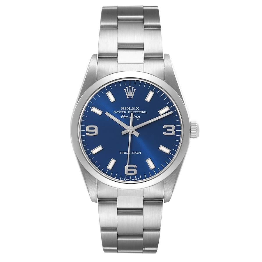 Rolex Air King 34mm blaues Zifferblatt glatte Lünette Stahl Herrenuhr 14000. Automatisches Uhrwerk mit Selbstaufzug. Gehäuse aus Edelstahl mit einem Durchmesser von 34 mm. Rolex Logo auf der Krone. Glatte, gewölbte Lünette aus Edelstahl. Kratzfestes
