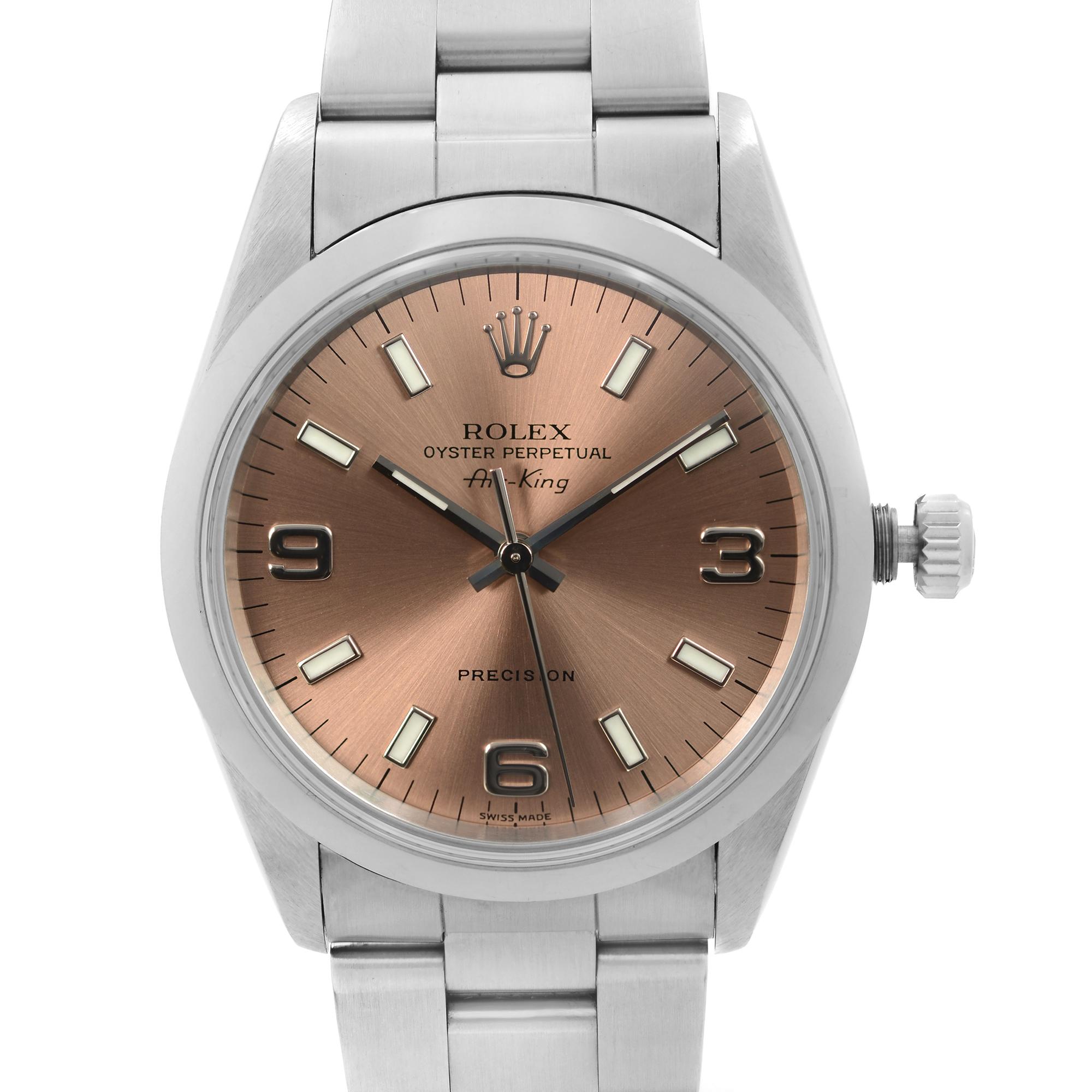 Pre Owned Rolex Air-King 34mm Stainless Steel Salmon Dial Automatic Mens Watch 14000. This Timepiece was Produced in 1999 and is Powered by Mechanical (Automatic) Movement and Features: Stainless Steel Case with a Oyster Steel Bracelet, Fixed