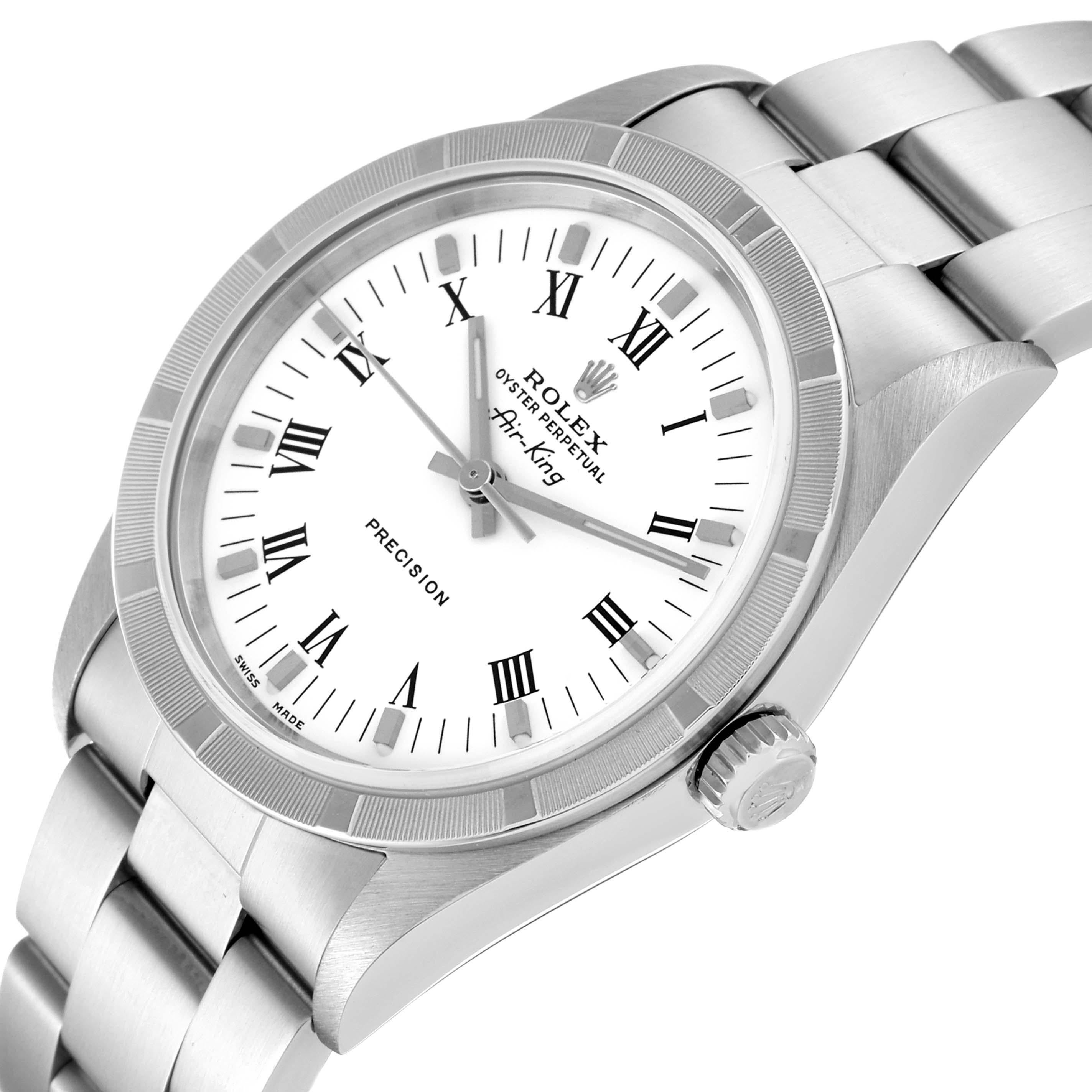Rolex Air King 34mm White Roman Dial Steel Mens Watch 14010. Automatic self-winding movement. Stainless steel case 34.0 mm in diameter. Rolex logo on a crown. Stainless steel engine turned bezel. Scratch resistant sapphire crystal. White dial with