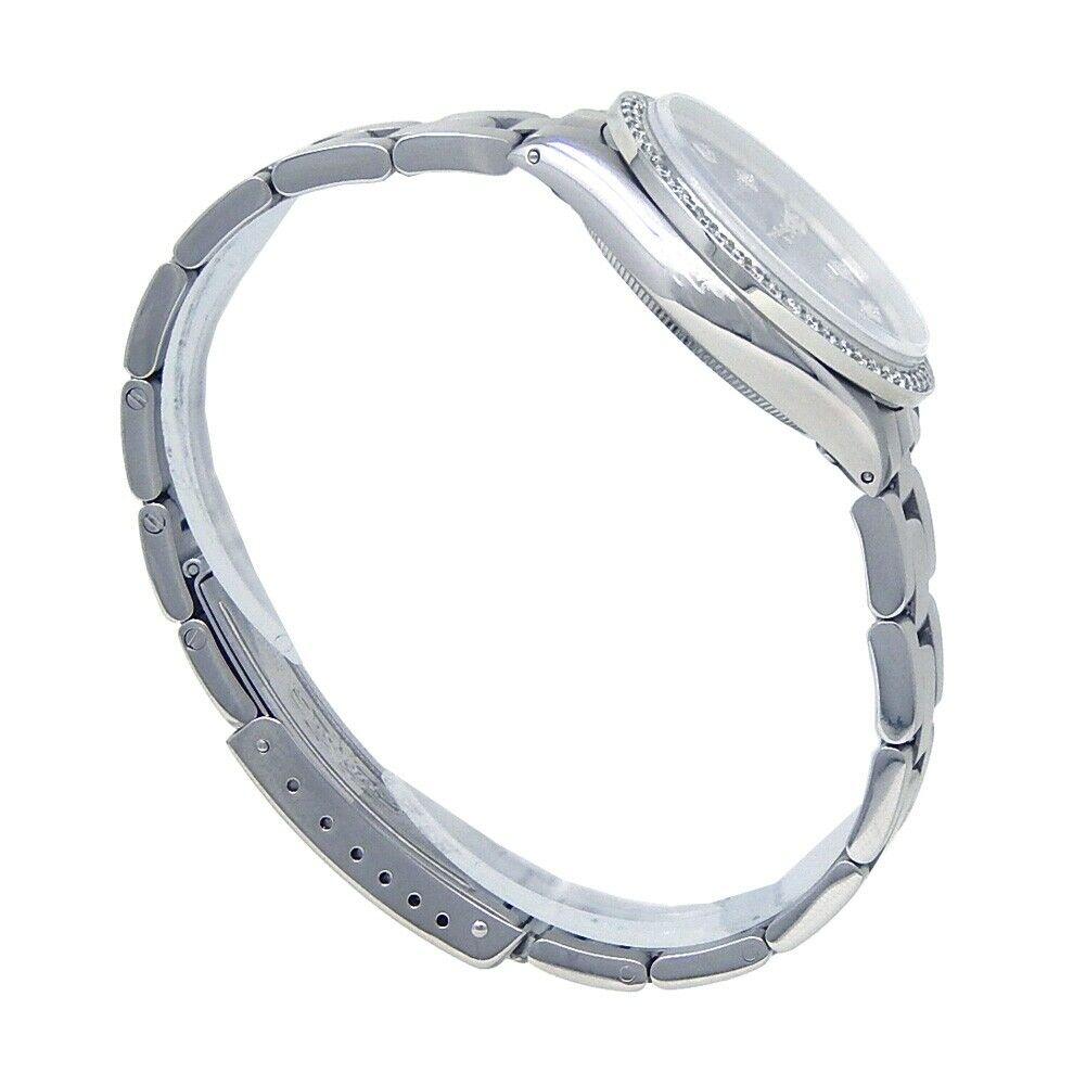 Brand: Rolex
Band Color: Stainless Steel	
Gender:	Unisex
Case Size: 32-35.5mm	
MPN: Does Not Apply
Lug Width: 18mm	
Features:	Diamond Bezel, Diamond Dial, Non-Numeric Hour Marks, Sapphire Crystal, Swiss Made, Swiss Movement
Style: Casual	
Movement: