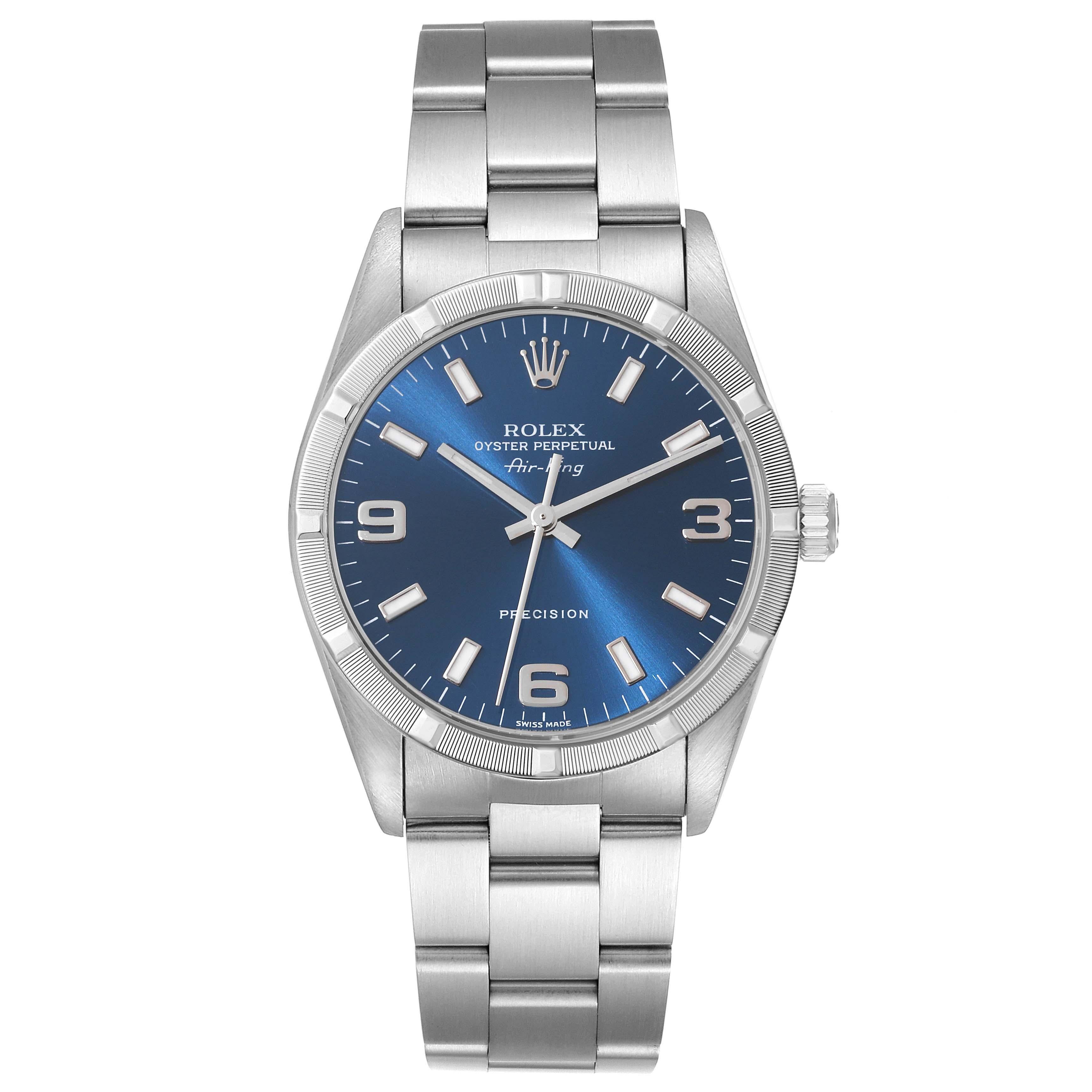 Rolex Air King Blue Dial Engine Turned Bezel Steel Mens Watch 14010 Box Papers. Automatic self-winding movement. Stainless steel case 34 mm in diameter. Rolex logo on the crown. Stainless steel engine turned bezel. Scratch resistant sapphire