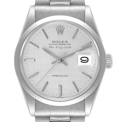 Rolex Montre vintage Air King Date avec cadran en acier inoxydable et lin argenté, pour hommes 5700