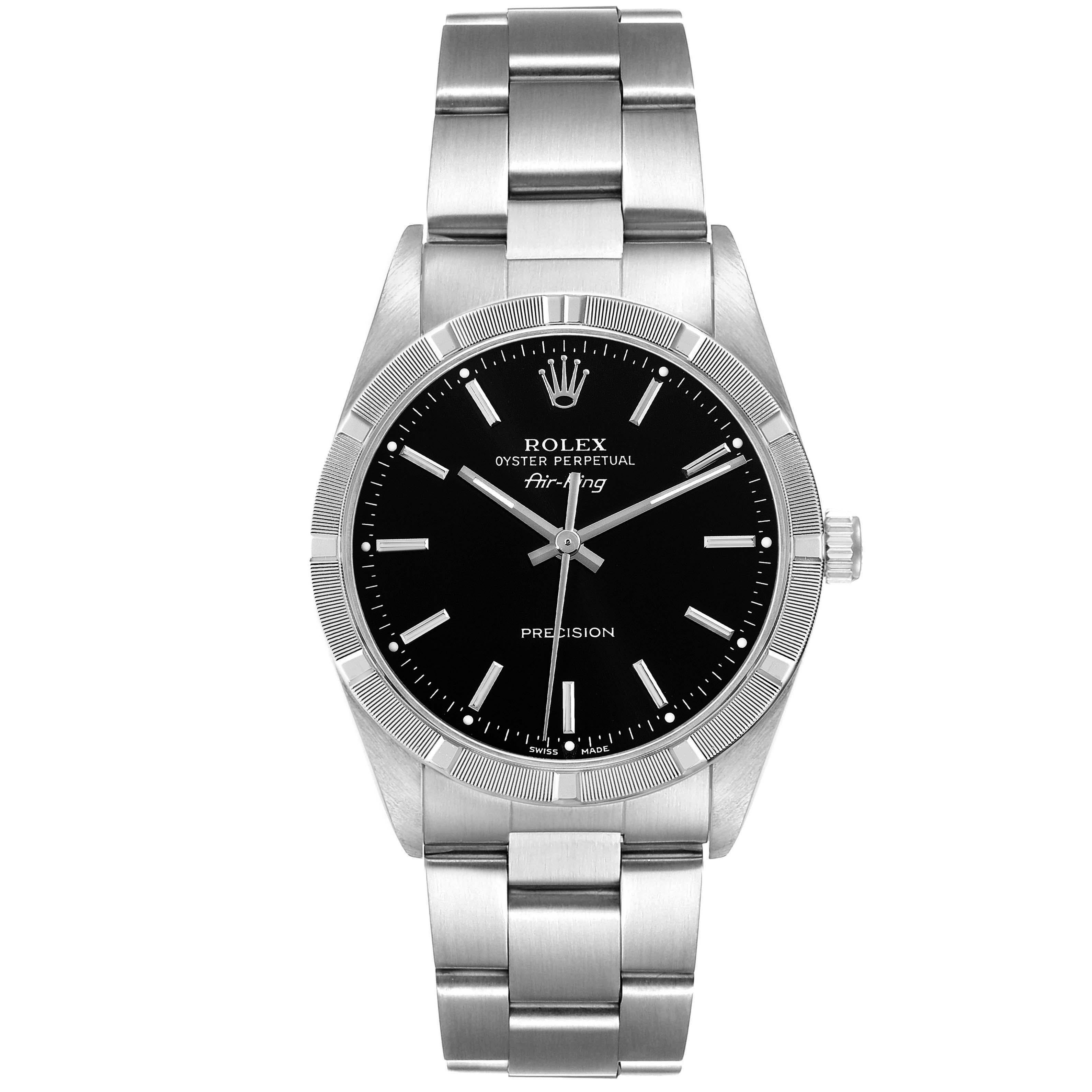 Rolex Air King Engine Turned Bezel Black Dial Steel Mens Watch 14010. Automatic self-winding movement. Stainless steel case 34.0 mm in diameter. Rolex logo on the crown. Stainless steel engine turned bezel. Scratch resistant sapphire crystal. Black