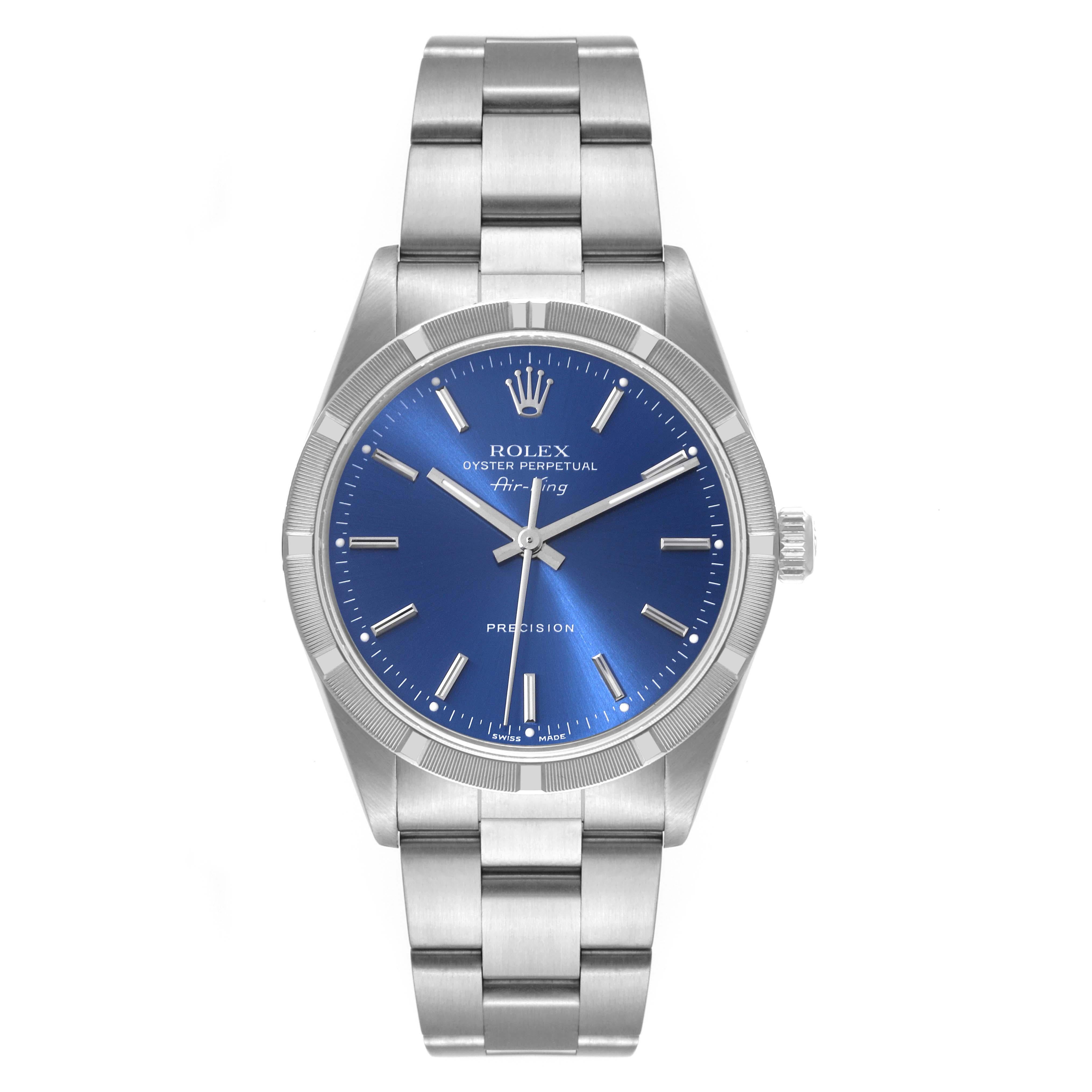 Rolex Air King Engine Turned Bezel Blue Dial Steel Mens Watch 14010. Automatic self-winding movement. Stainless steel case 34.0 mm in diameter. Rolex logo on the crown. Stainless steel engine turned bezel. Scratch resistant sapphire crystal. Blue