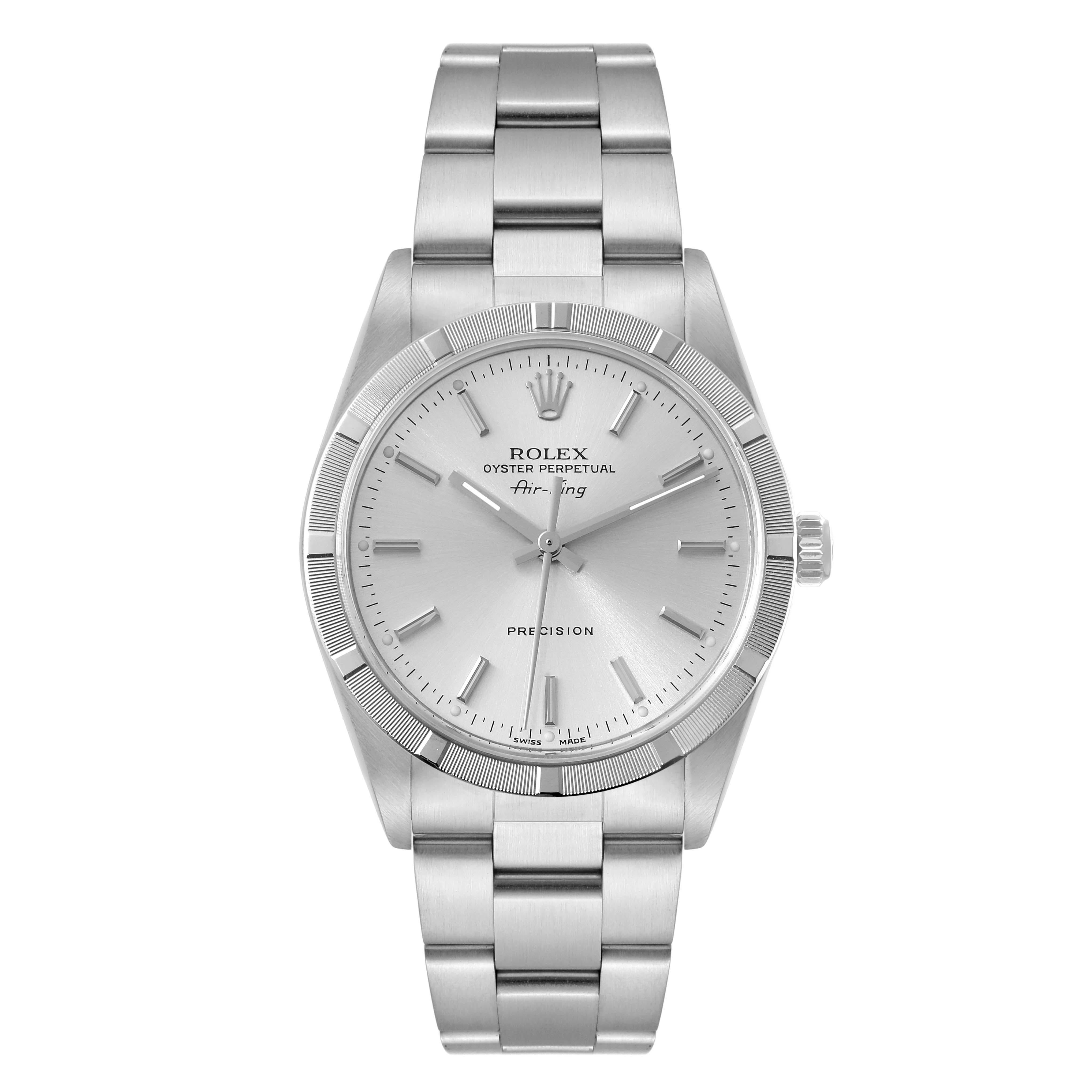 Rolex Air King Engine Turned Bezel Silver Dial Steel Mens Watch 14010. Automatic self-winding movement. Stainless steel case 34.0 mm in diameter. Rolex logo on the crown. Stainless steel engine turned bezel. Scratch resistant sapphire crystal.
