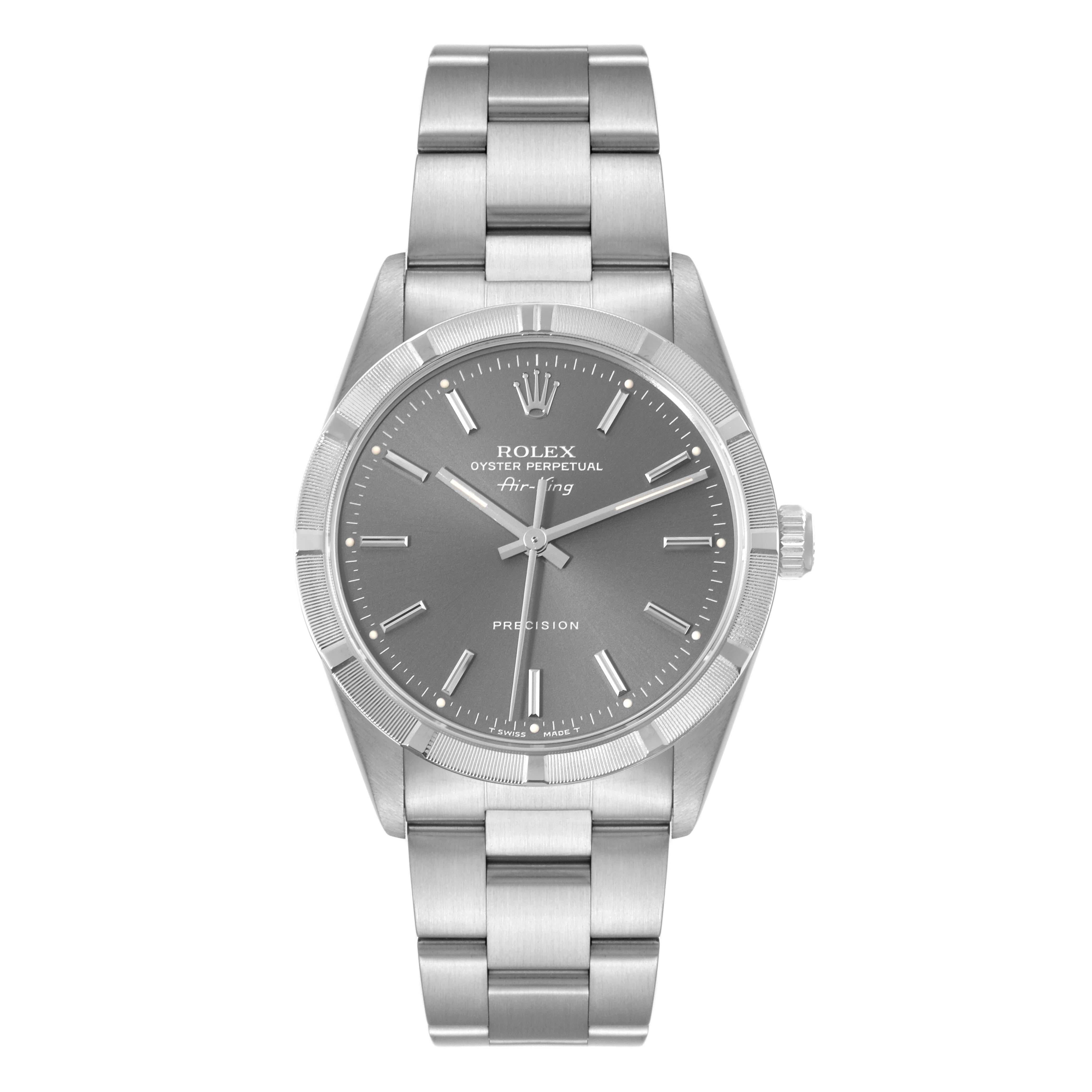 Rolex Air King Grey Dial Engine Turned Bezel Steel Mens Watch 14010. Automatic self-winding movement. Stainless steel case 34.0 mm in diameter. Rolex logo on the crown. Stainless steel engine turned bezel. Scratch resistant sapphire crystal. Grey