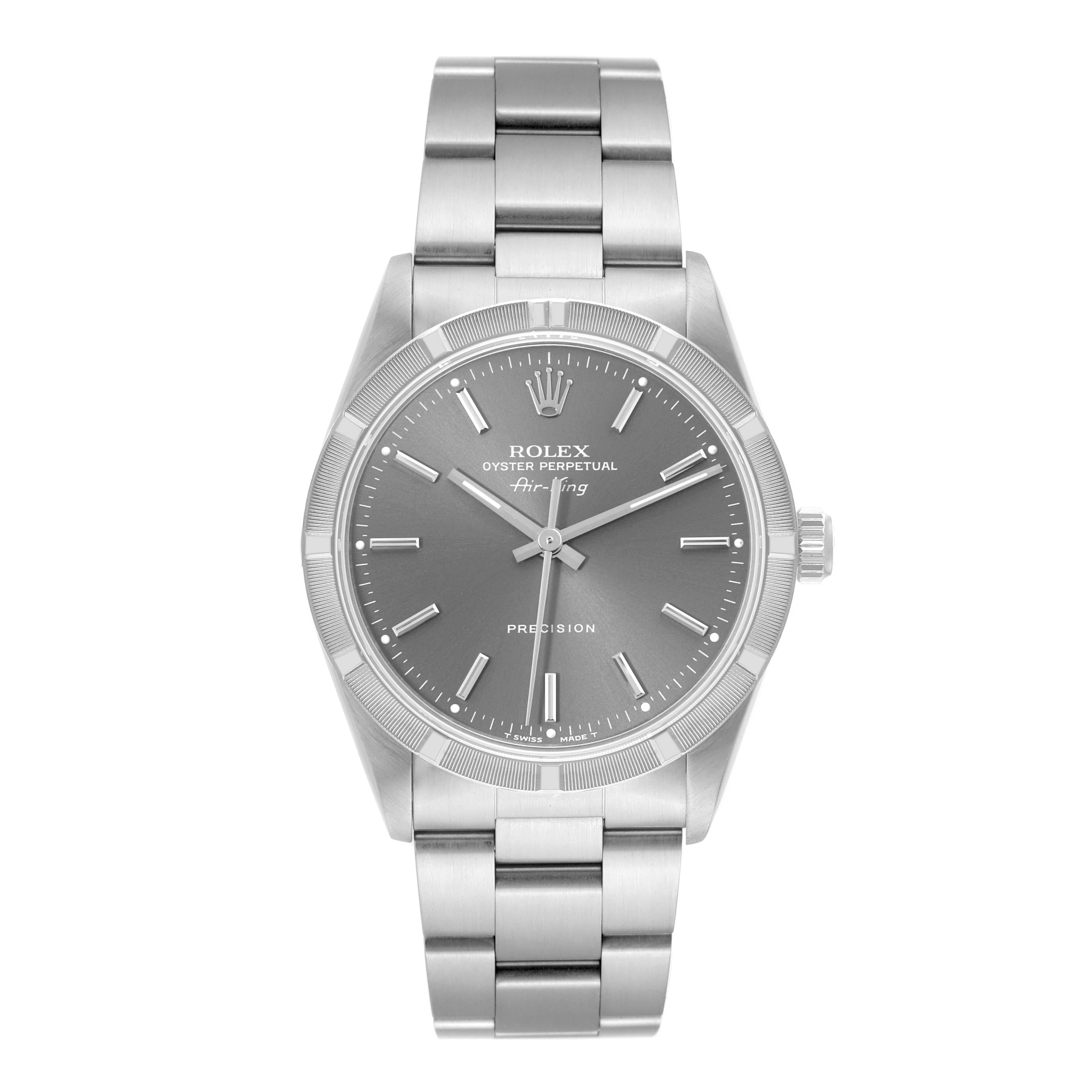 Rolex Air King Grey Dial Engine Turned Bezel Steel Mens Watch 14010. Automatic self-winding movement. Stainless steel case 34.0 mm in diameter. Rolex logo on the crown. Stainless steel engine turned bezel. Scratch resistant sapphire crystal. Grey
