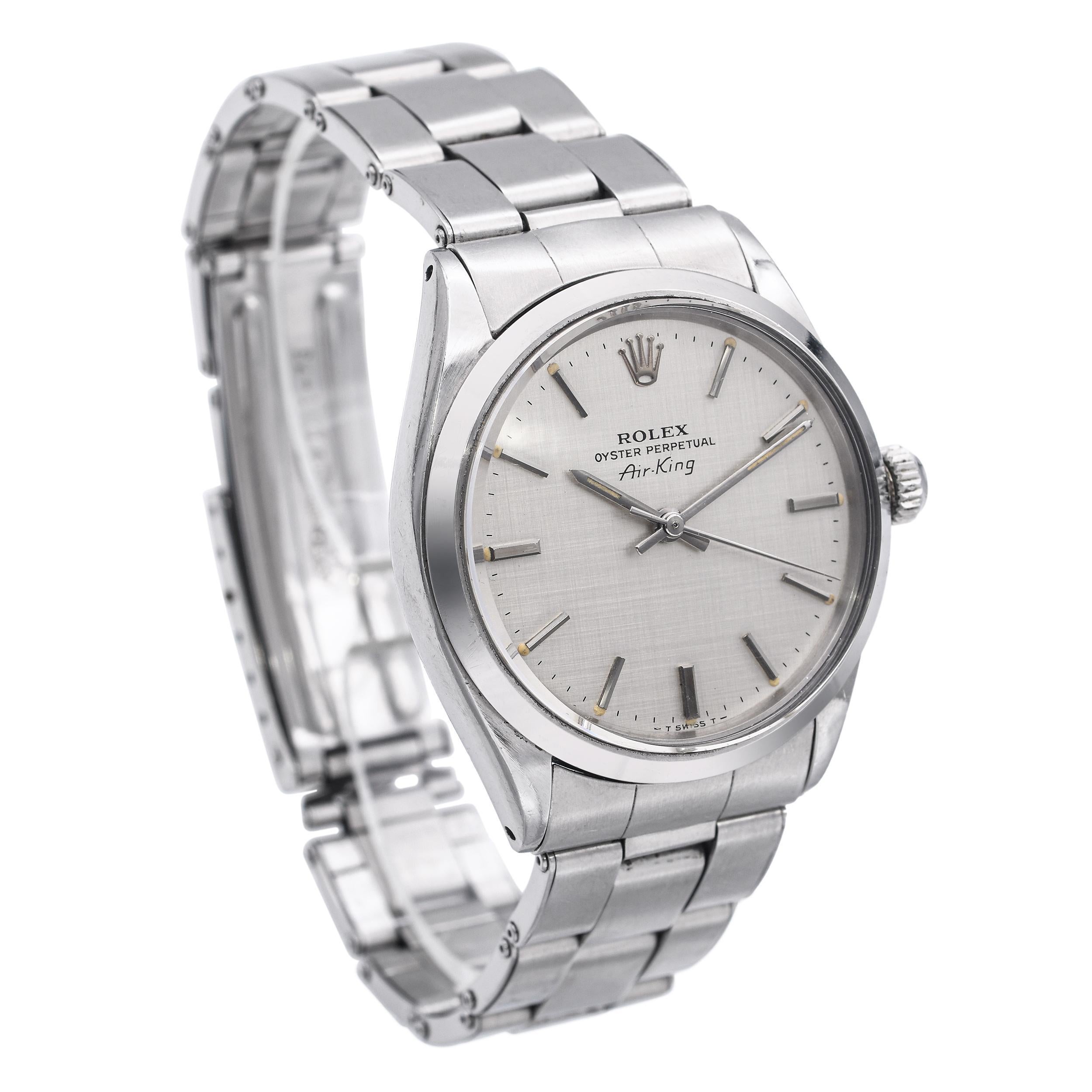 This vintage Rolex Air-King Ref. 5500 is a classic example of mid-century Rolex craftsmanship, known for its understated elegance and reliability. Housed in a stainless steel 34mm Oyster case, the watch features a clean, minimalist dial—often in