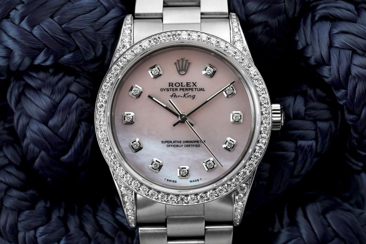 Rolex Air King Montre en acier 14000 Cadran en nacre rose Lunette et cornes à diamants

