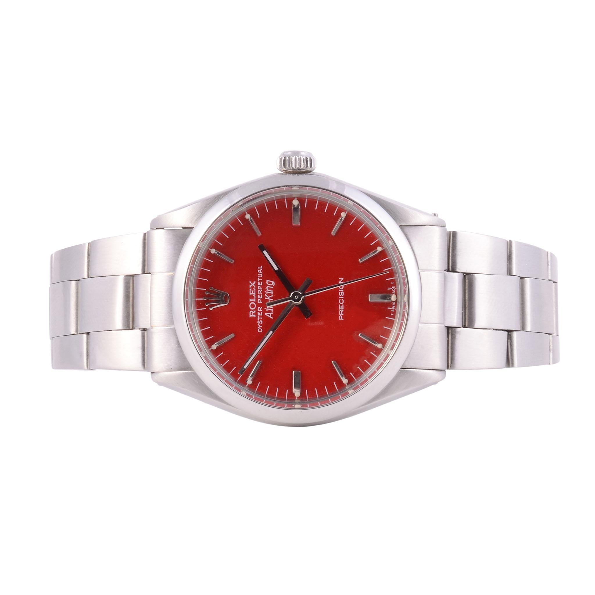 Vintage Rolex Air King red dial steel wrist watch, circa 1968. This vintage Rolex Air King wrist watch features a steel case with custom red restored original dial with baton markers. The steel Rolex wrist watch has a 26 jewel perpetual movement and
