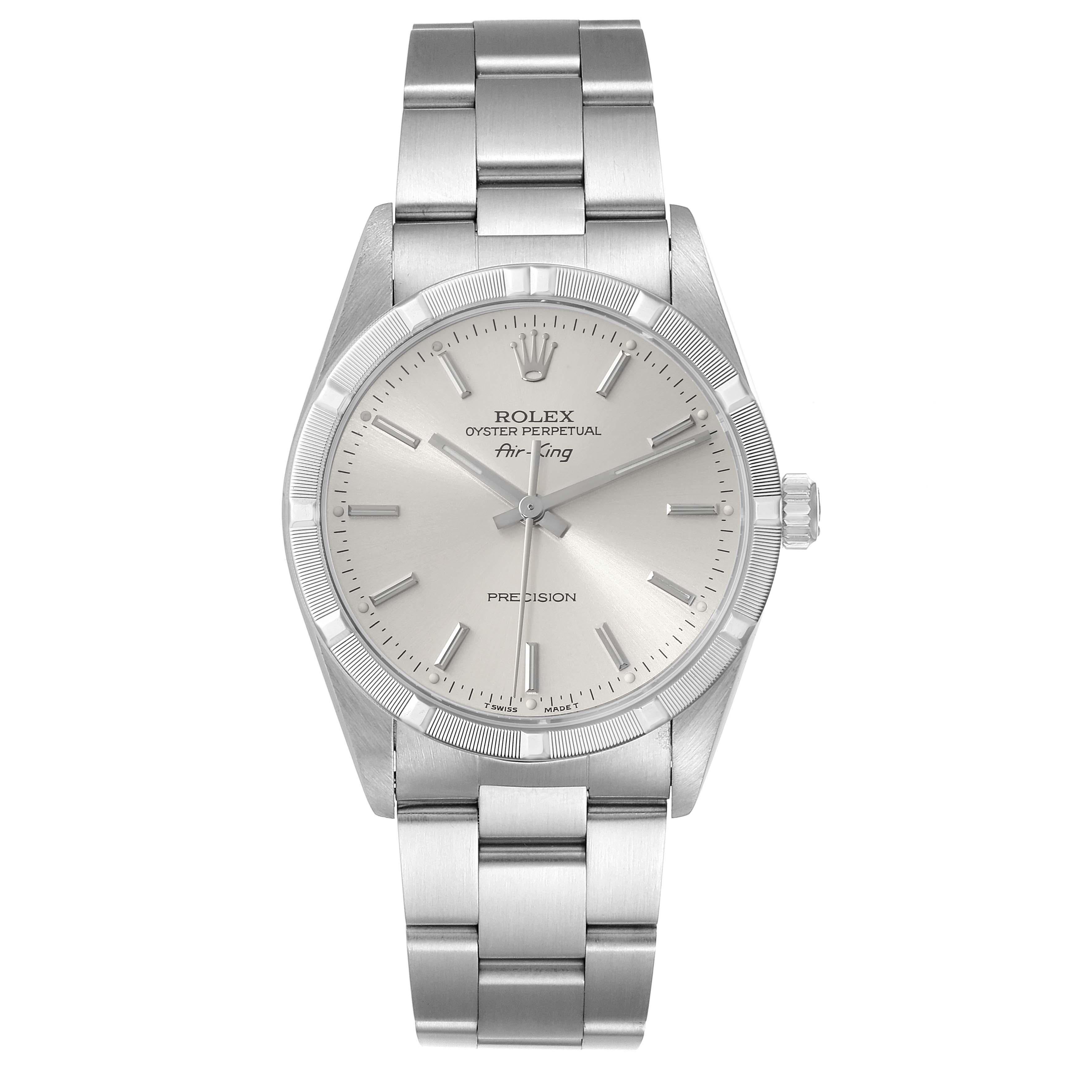 Rolex Air King Silver Dial 34mm Engine Turned Bezel Steel Mens Watch 14010. Automatic self-winding movement. Stainless steel case 34.0 mm in diameter. Rolex logo on crown. Stainless steel engine turned bezel. Scratch resistant sapphire crystal.