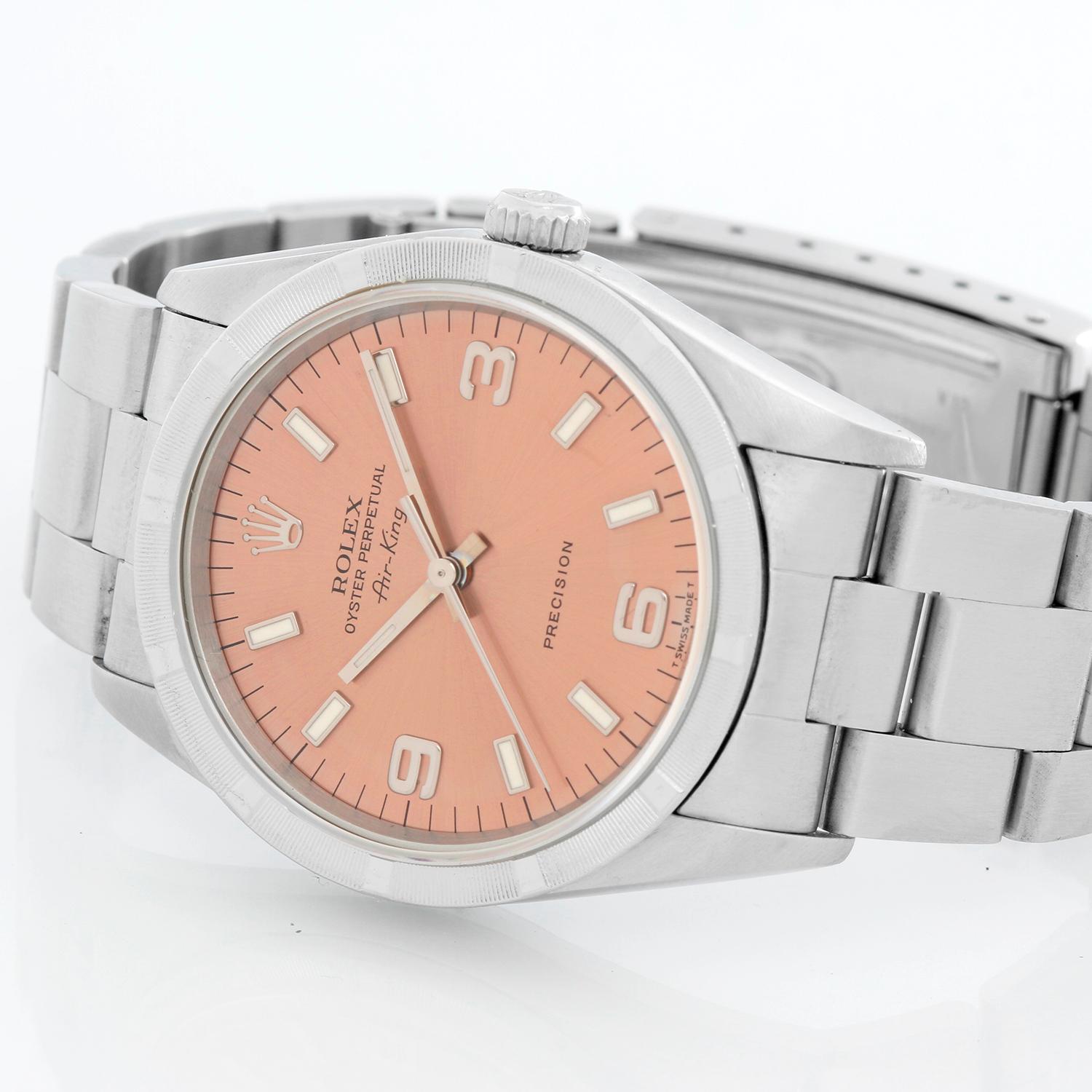 Rolex Air King Stainless Steel Men's Watch 14010 - Automatic winding. Stainless Steel ( 36 mm ). Rose dial with white stick hour markers. Stainless Steel Oyster bracelet. Pre-owned with box .