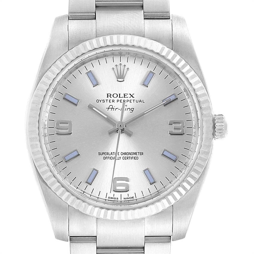 Rolex Air King Steel White Gold Blue Hour Markers Mens Watch 114234. Officially certified chronometer self-winding movement. Stainless steel case 34.0 mm in diameter. Rolex logo on a crown. 18K white gold fluted bezel. Scratch resistant sapphire