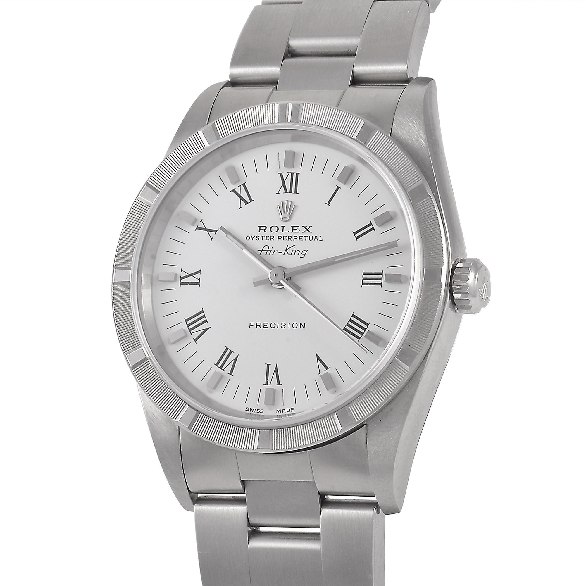 The Rolex Air-King Watch, reference number 14010M, possesses a truly timeless sense of style.

This luxury timepiece includes a 34mm case, index bezel, and Oyster bracelet crafted from shimmering stainless steel. On the minimalist white dial, you’ll