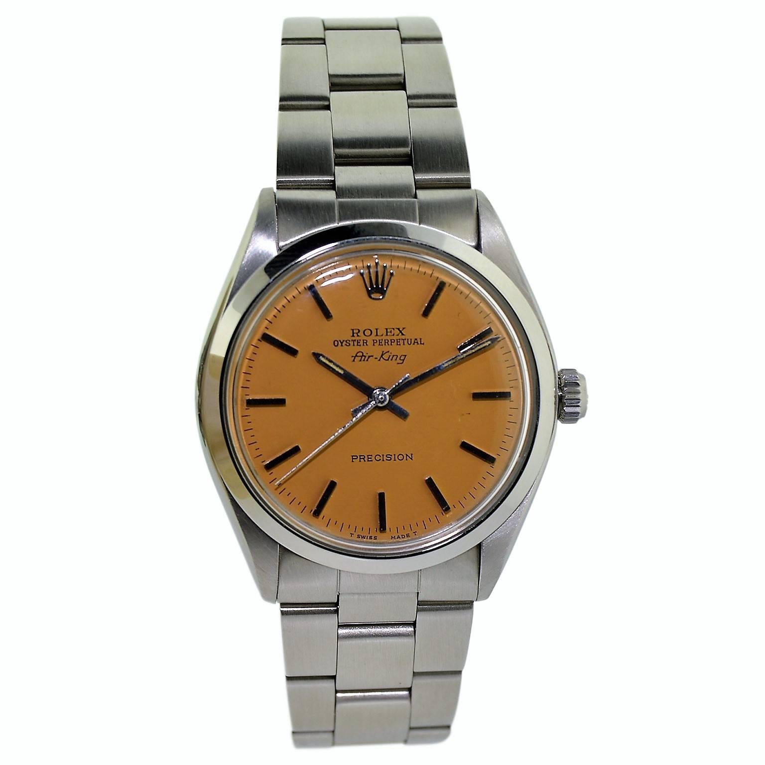 FACTORY / HOUSE: Rolex Watch Comany
STYLE / REFERENCE: Air King / Ref. 5500
METAL / MATERIAL: Stainless Steel 
CIRCA: 1970's
DIMENSIONS: 39mm X 34mm
MOVEMENT / CALIBER: Perpetual Winding / 26 Jewels / Cal. 1520
DIAL / HANDS: Custom Burnt Orange with