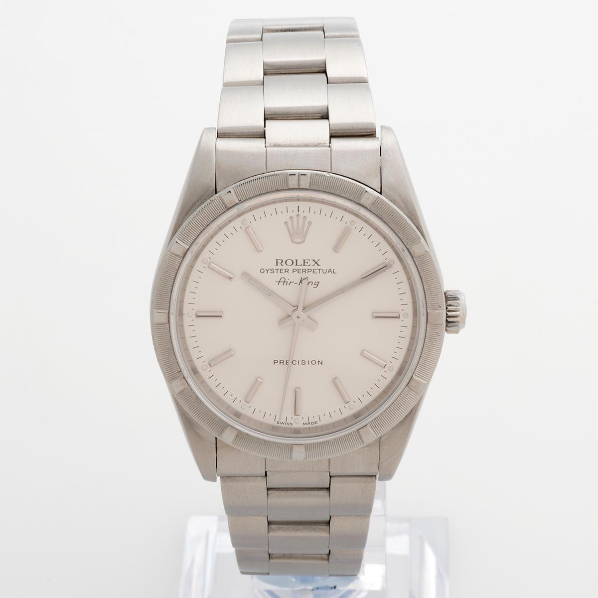 Our classic neo vintage Rolex Air-King reference 140101M features a stainless steel 34mm case with engine turned bezel and Oyster bracelet, and silver dial. Presented in excellent condition for its age, this Air-King has light signs of use overall,
