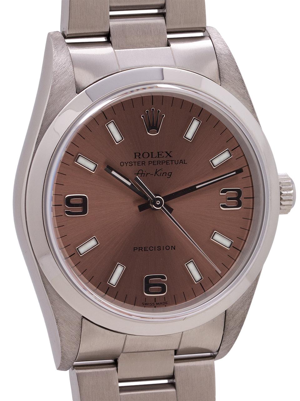 
Rolex Airking ref 14000 serial #P5  circa 2000. Featuring 34mm diameter stainless steel case with smooth bezel and sapphire crystal. With popular salmon (rose) 3/6/9 Explorer style dial with luminous indexes and hands. Powered by self winding