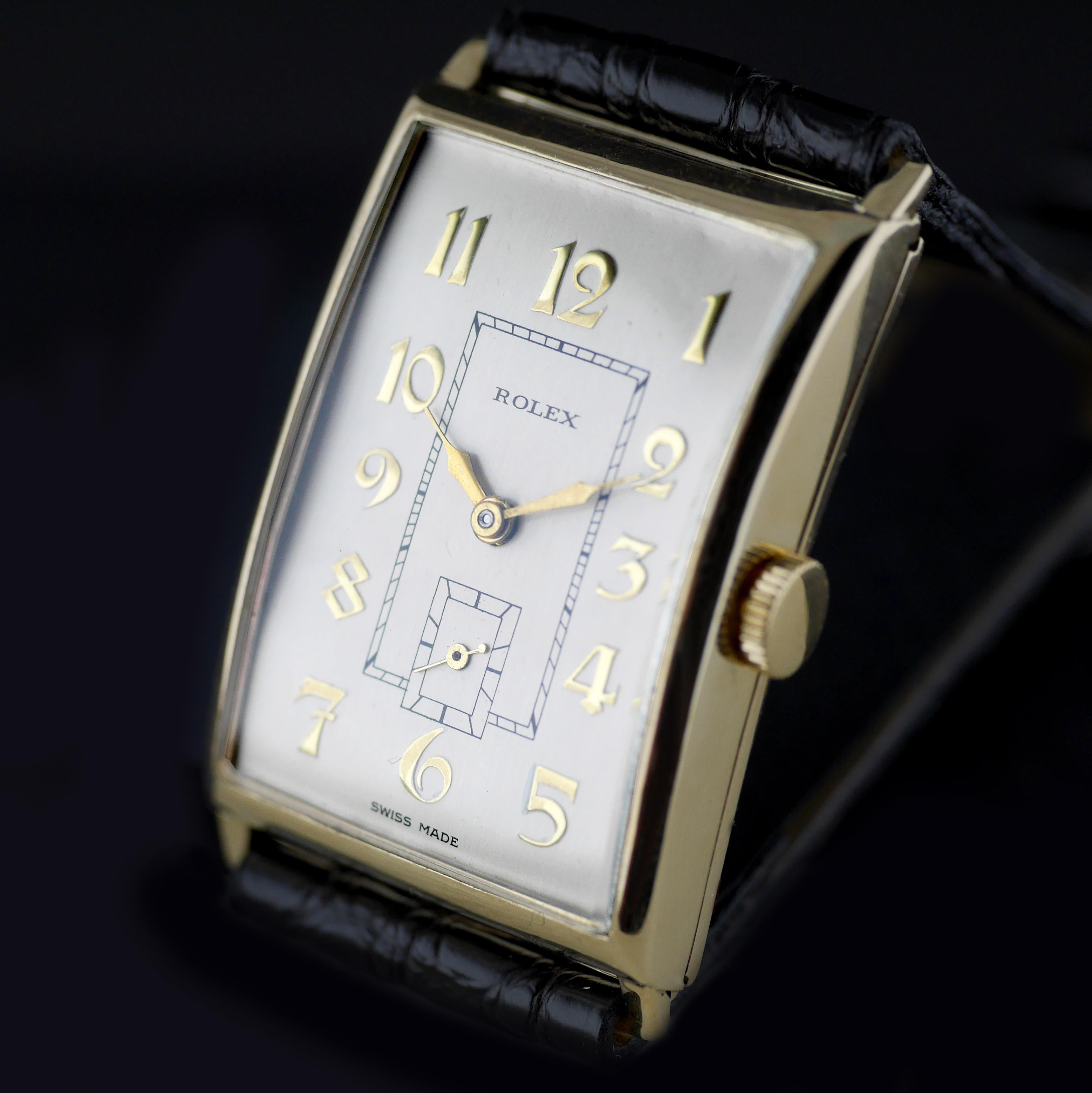 An Art Deco vintage wristwatch by Rolex made in 1930. A rare and unusually large size for a watch of this period, when the majority of watches were much smaller .

Gold rectangular shaped case marked with the “RWC Ltd” lozenge for the Rolex Watch