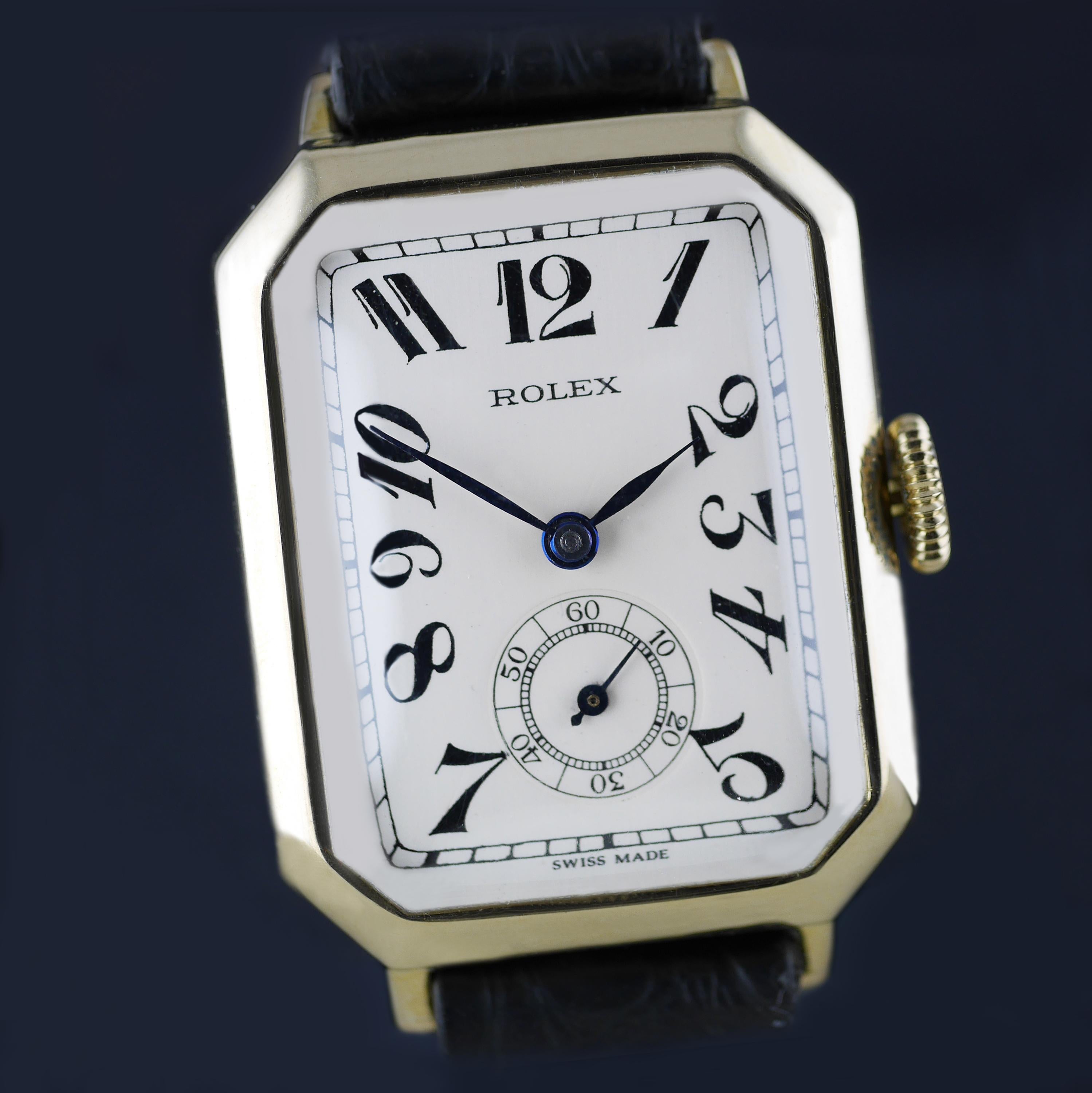 An Art Deco vintage wristwatch by Rolex made in 1933. This unusual and rare Rolex, with a distinctive shaped case, was made in the height of the Art Deco era. 

Gold rectangular shaped case marked with the “RWC Ltd” lozenge for the Rolex Watch