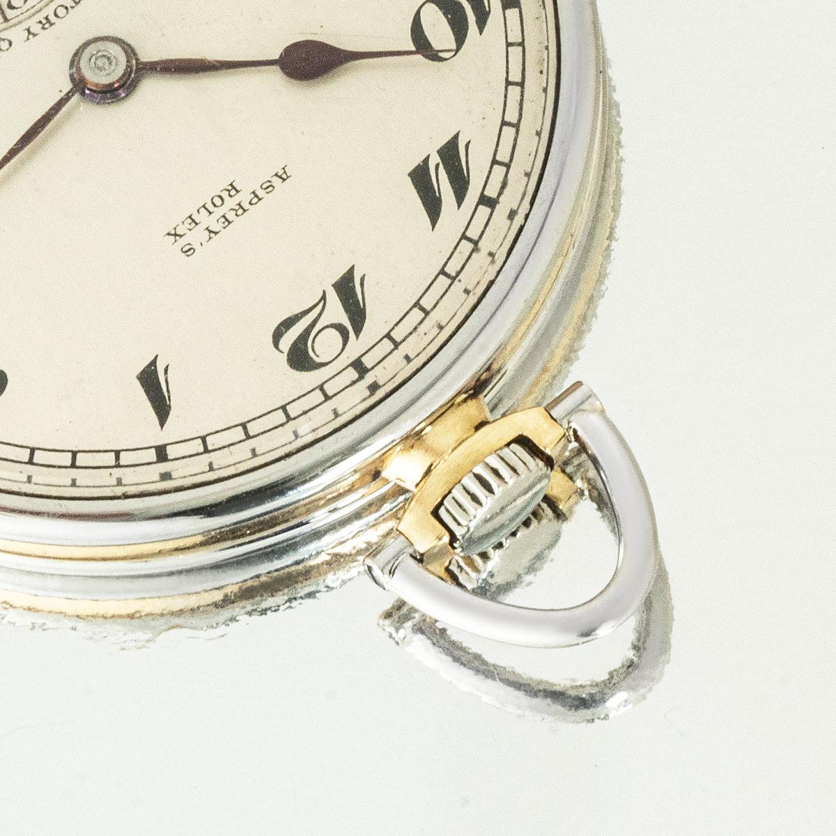 Rolex, Retailed by Asprey. A Very Rare Gold Observatory 18ct Two Colour Gold Keyless Lever Pocket Watch C1920 with Matching Two Colour Gold Dress Chain


Dial: The original silver matt dial fully signed Asprey's Rolex Observatory Quality with black