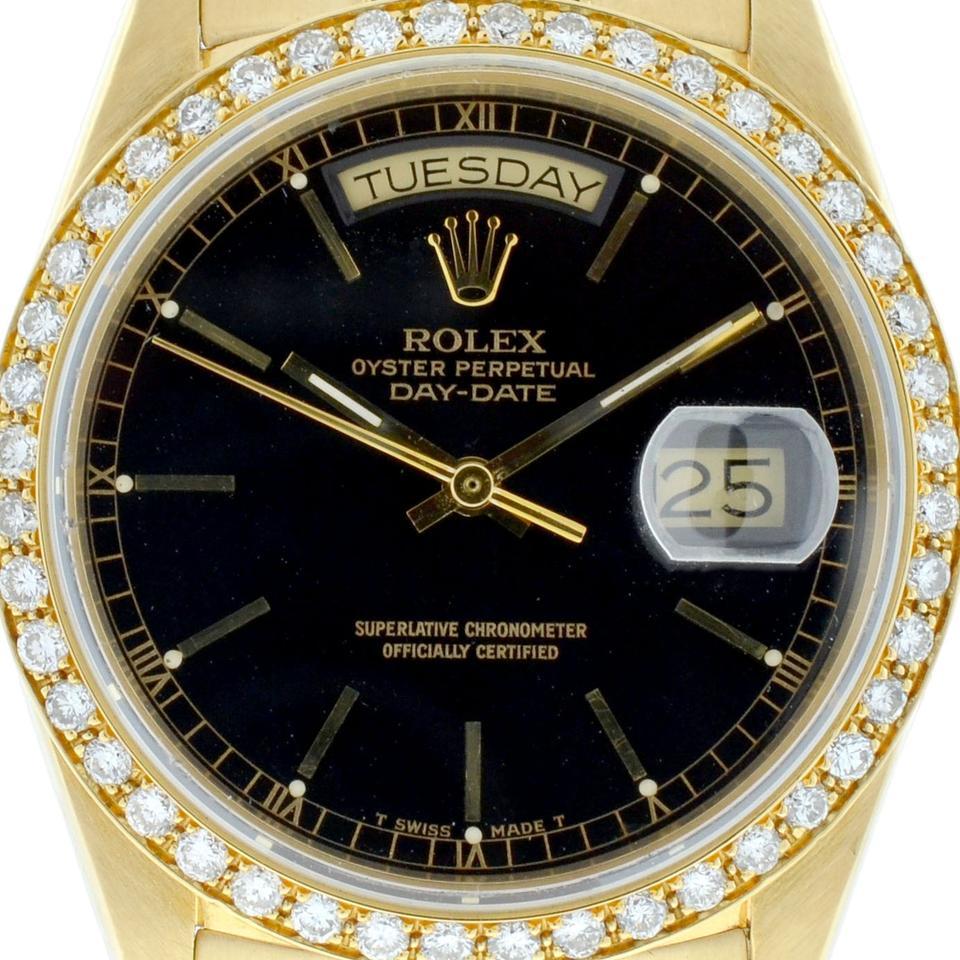 Company - Rolex
Style - Watch
Model - President
Reference Number - 18038
Case Metal - 18k Yellow Gold
Case Measurement - 36mm
Bracelet - 18k Yellow Gold
Dial - Champagne
Bezel - Aftermarket 18k Yellow gold and Diamonds
Crystal - Scratch Resistant