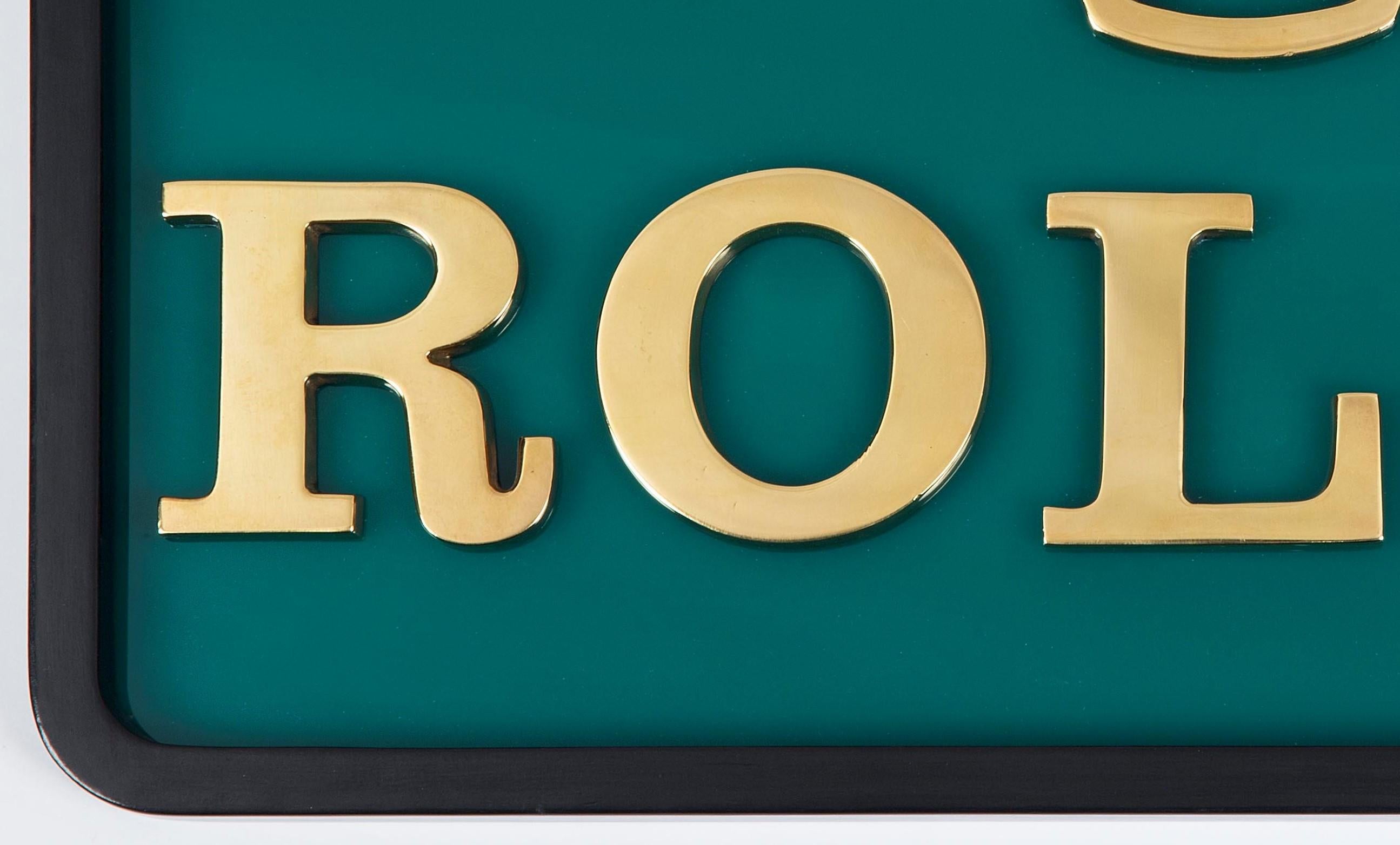 'A Crown for Every Achievement'

Rolex bronze dealership display, 1960

An unusual and highly decorative dealership display for luxury Swiss watch brand Rolex, the polished bronze letters, made circa 1960 are remounted onto a polished Cadmium