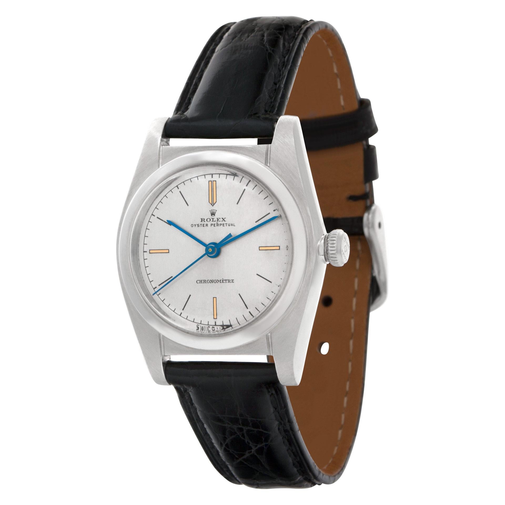 This Rolex Stainless Steel Bubbleback, circa 1944, is a remarkable vintage piece, complete with its original untouched dial, maintaining its genuine and authentic appearance. The watch is paired with a classic leather strap, adding to its timeless