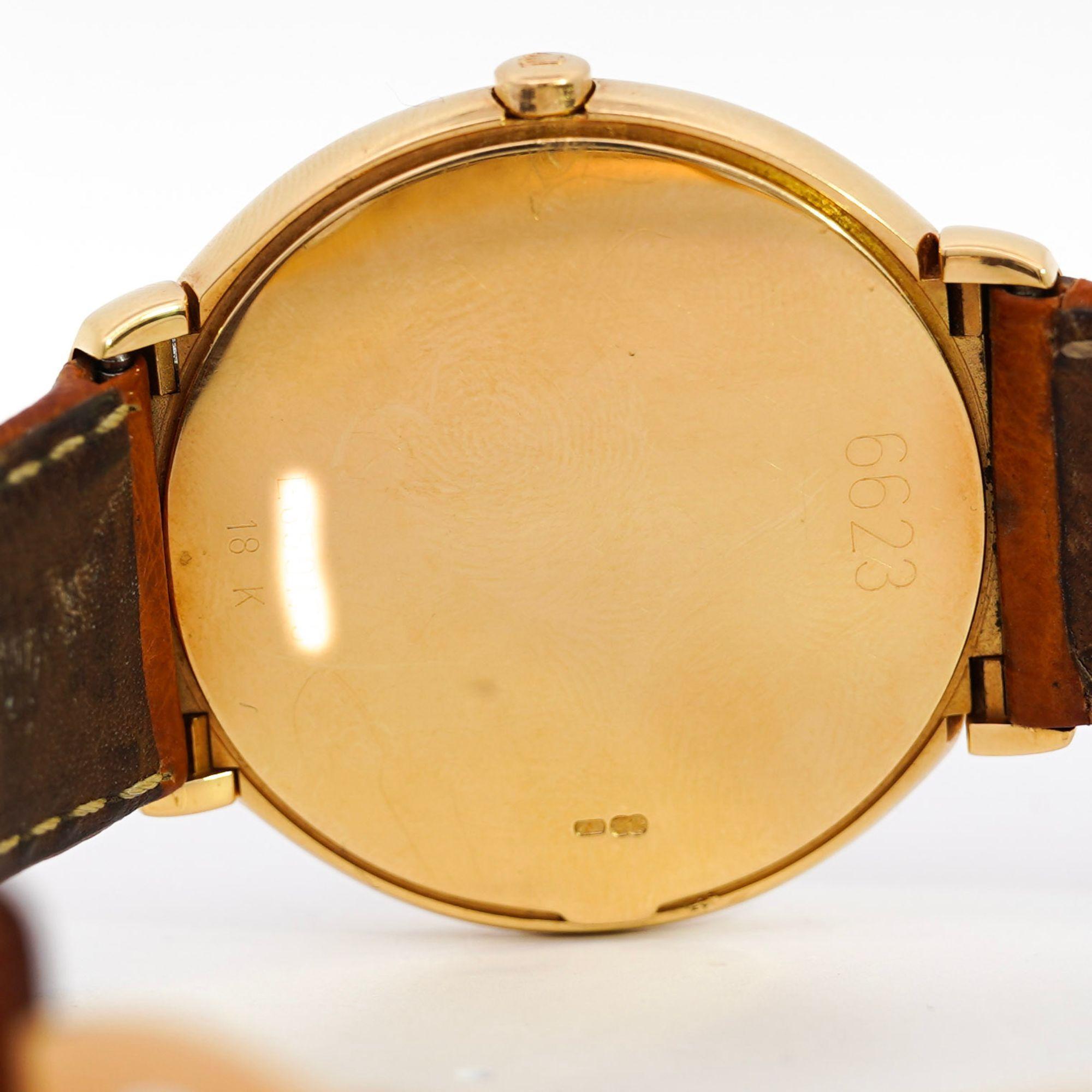 Vintage Rolex Cellini 37mm in 18k gold case and ostrich leather strap. 1990 year with the original Cellini anniversary box and papers.

Details:
Brand: Rolex
Model: Cellini 18K Gold
Reference Number: 6623
Serial Number: E******
Case Material: 18K