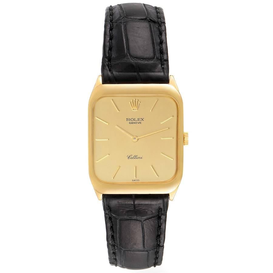 Rolex Cellini 18k Yellow Gold Black Strap Mens Vintage Watch 4135. Manual winding movement. 18k yellow gold rectangular case with rounded corners 26.0 x 34.0 mm. Rolex logo on a crown. Hooded lugs. . Scratch-resistant sapphire crystal. Champagne