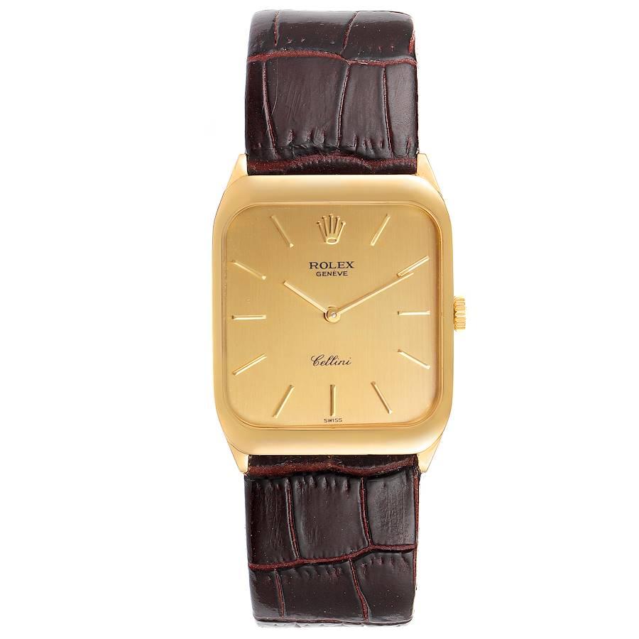 Rolex Cellini 18k Yellow Gold Brown Strap Mens Vintage Watch 4135. Manual winding movement. 18k yellow gold rectangular case with rounded corners 26.0 x 34.0 mm. Rolex logo on a crown. Hooded lugs. . Scratch-resistant sapphire crystal. Champagne