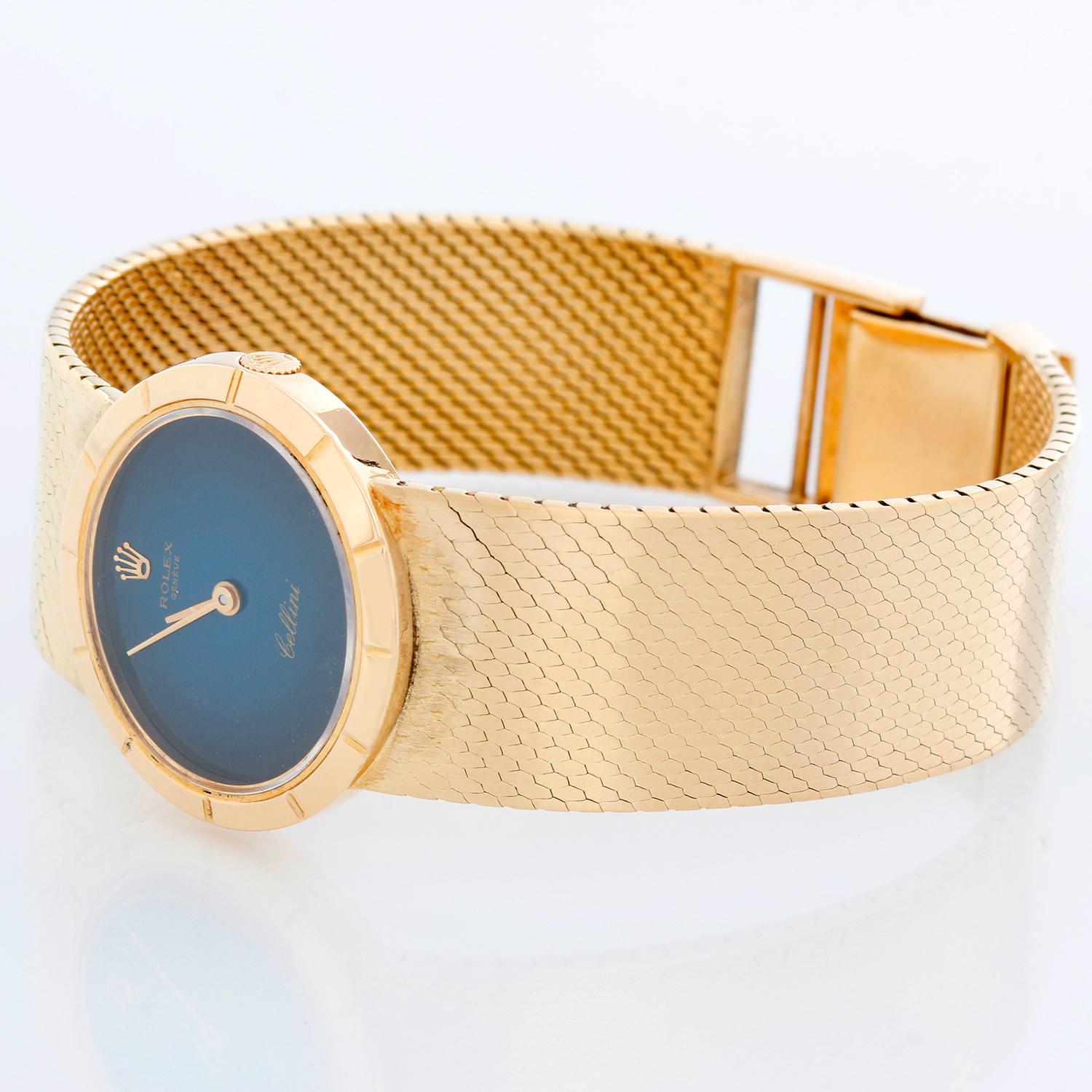Rolex Cellini 18k Yellow Gold Ladies Dress Watch - Manual winding. 18k yellow gold case (32mm diameter). Blue dial with gold hands. Integrated gold mesh style bracelet (6 1/2 inches). Pre-owned with custom box.