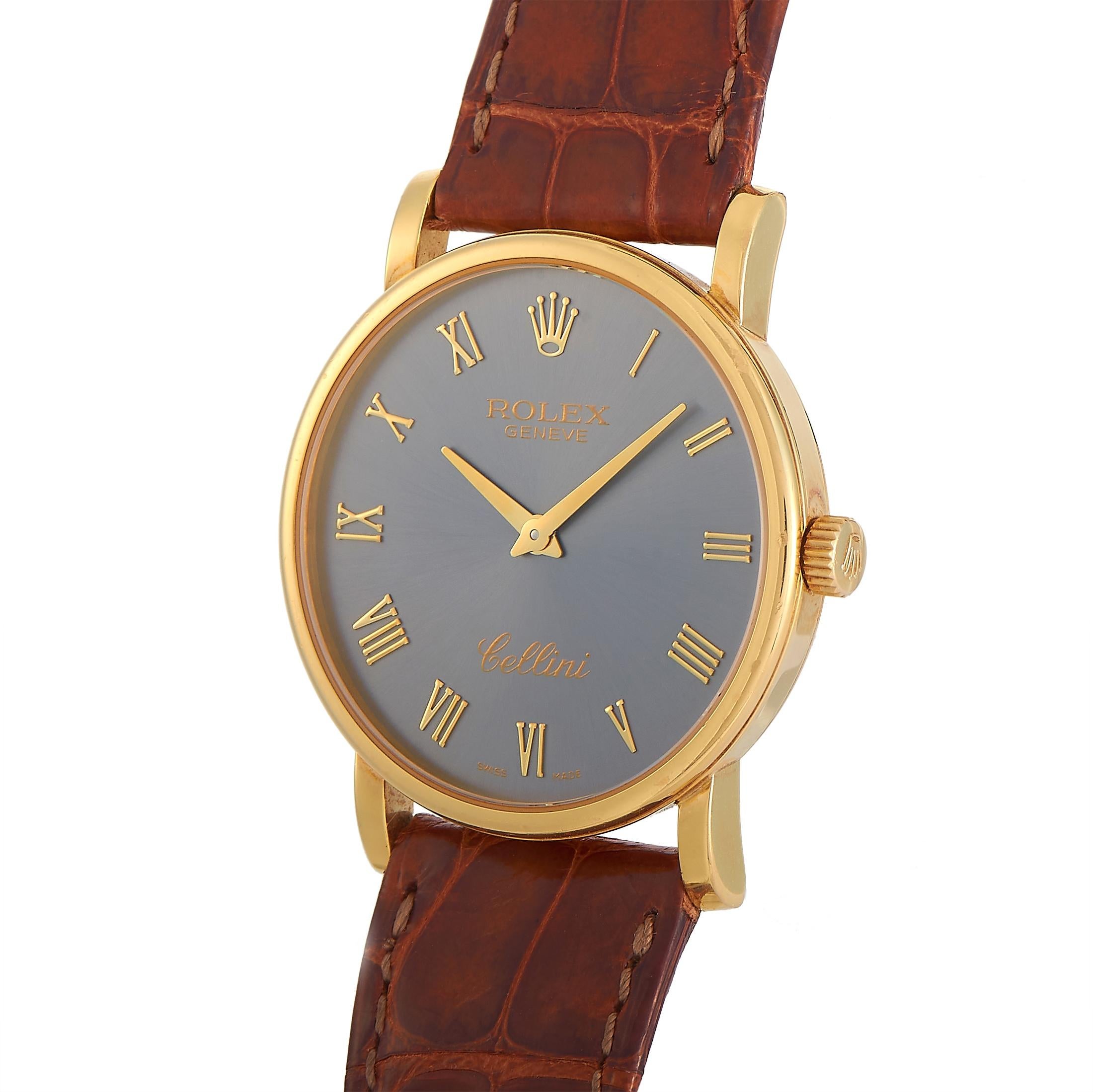A handsome statement watch with a minimalist design, this Rolex Cellini 18K Yellow Gold Slate Watch 5115/8 is a discontinued model carrying the 