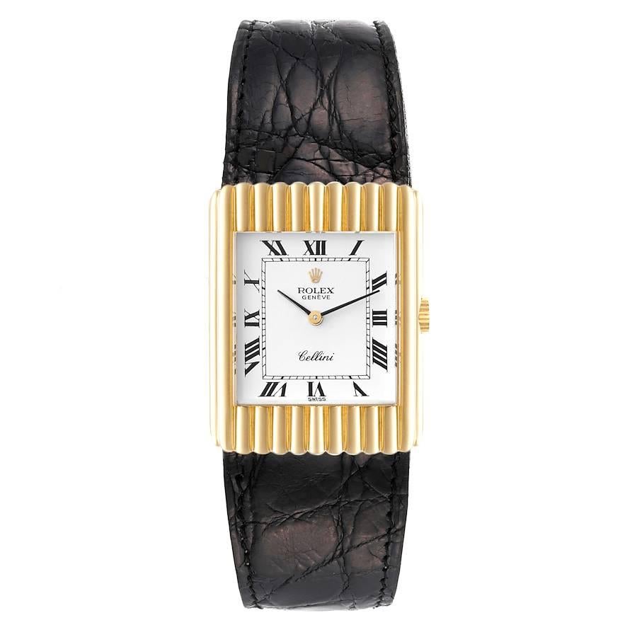 Rolex Cellini 18K Yellow Gold White Dial Vintage Mens Watch 4016. Manual winding movement. 18k yellow gold ribbed rectangular case 24.0 x 33.0 mm. Hooded lugs. . Acrylic crystal. White dial with Roman numeral hour markers. Custom black leather strap