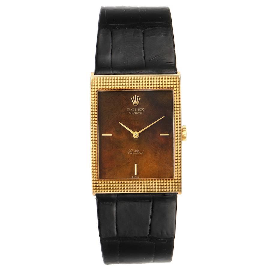 Rolex Cellini 18k Yellow Gold Wooden Dial Vintage Mens Watch 4127. Manual winding movement. 18k yellow gold  rectangular case 24.0 x 33.0 mm. Rolex logo on a crown. Hooded lugs. 18k yellow gold wide hobnail bezel. Mineral glass crystal. Wood 