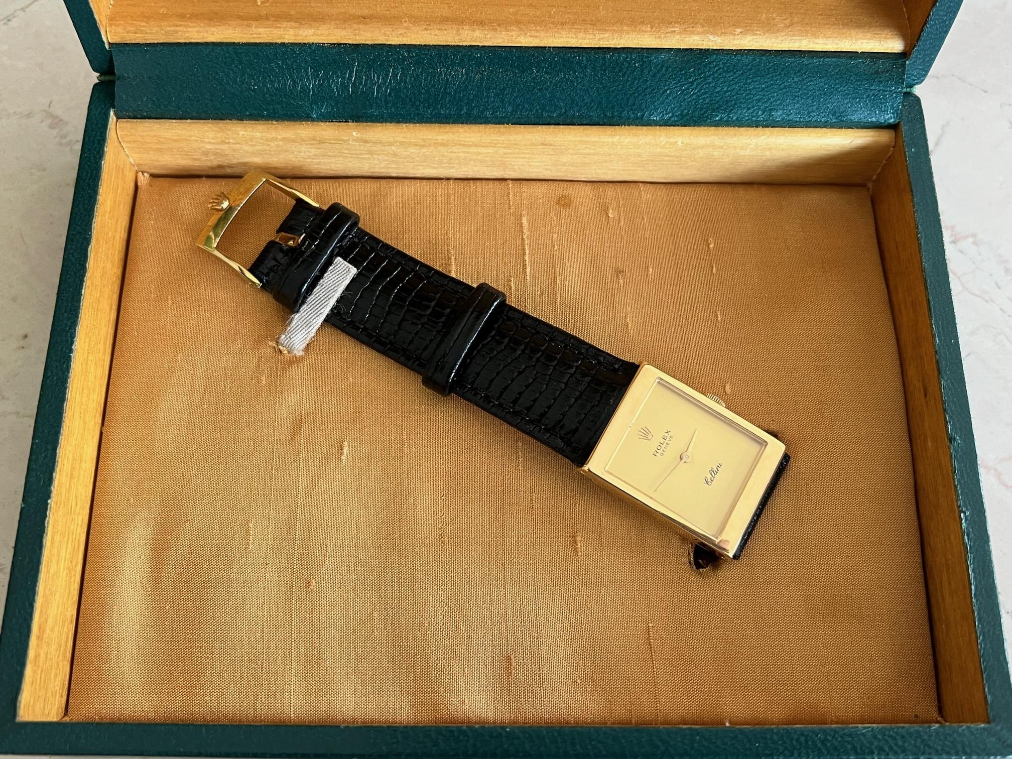 A beautiful and rare with original inner/outer box Rolex Cellini, reference 4014, ca'1970's. Manual wind watch in 18k gold. Wears nicely on the wrist at 22x30mm case. Bracelet replaced. We have been a 1stdibs seller since 2004, brick and mortar