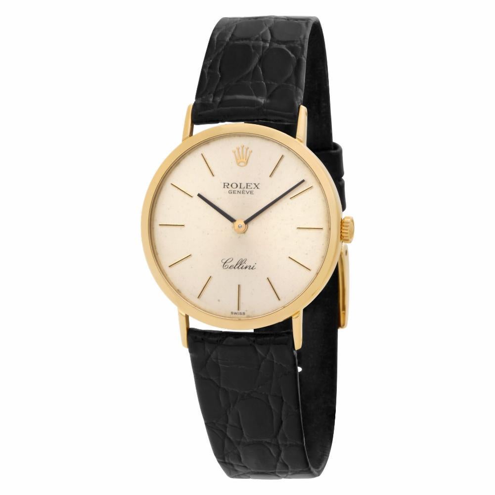 Rolex Cellini Reference #:4112. Rolex Cellini in 18k with champagne dial on black crocodile strap with Rolex gold tone tang buckle. Manual. 32 mm case size. Ref 4112. Circa 1980s. Fine Pre-owned Rolex Watch. Certified preowned Classic Rolex Cellini