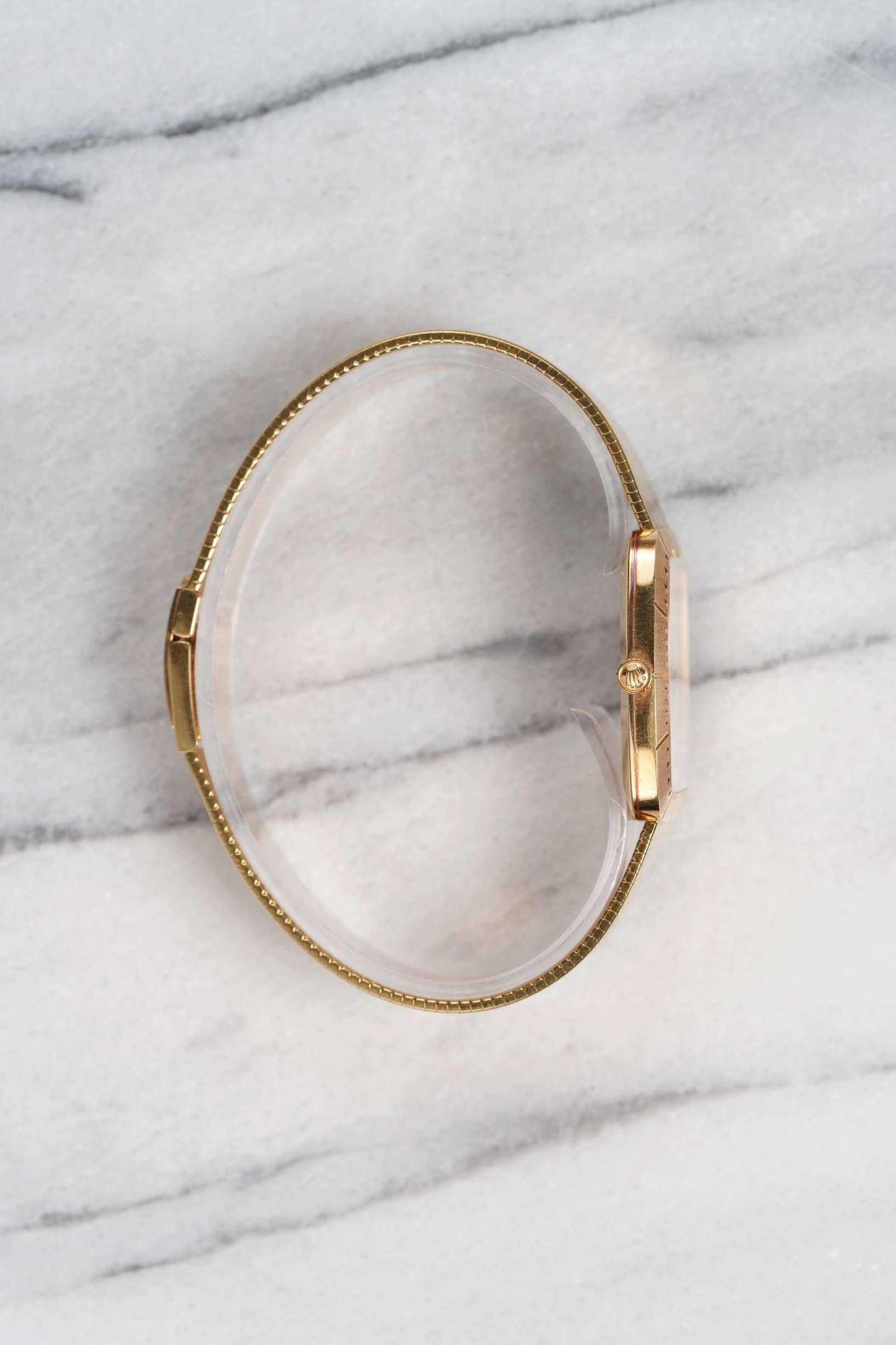 We’re pleased to offer a beautifully preserved and character-rich example of the Rolex Cellini Ref. 4322 in solid 18k yellow gold, housed in a distinctive tonneau-shaped case and paired with its original, uncut bracelet—a rare find that collectors