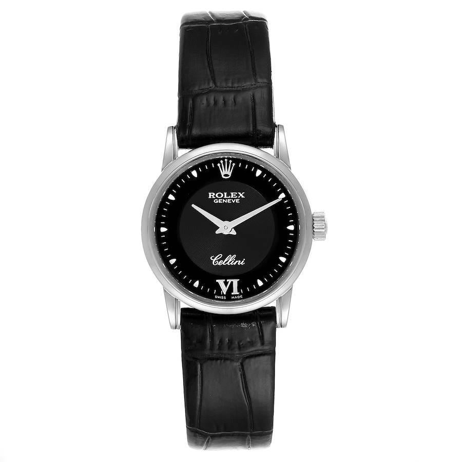 Rolex Cellini Classic 18k White Gold Black Dial Ladies Watch 6111. Quartz movement. 18k white gold slim case 26.0 mm in diameter. . Scratch resistant sapphire crystal. Flat profile. Black dial with white hour markers and raised roman numeral at 6.