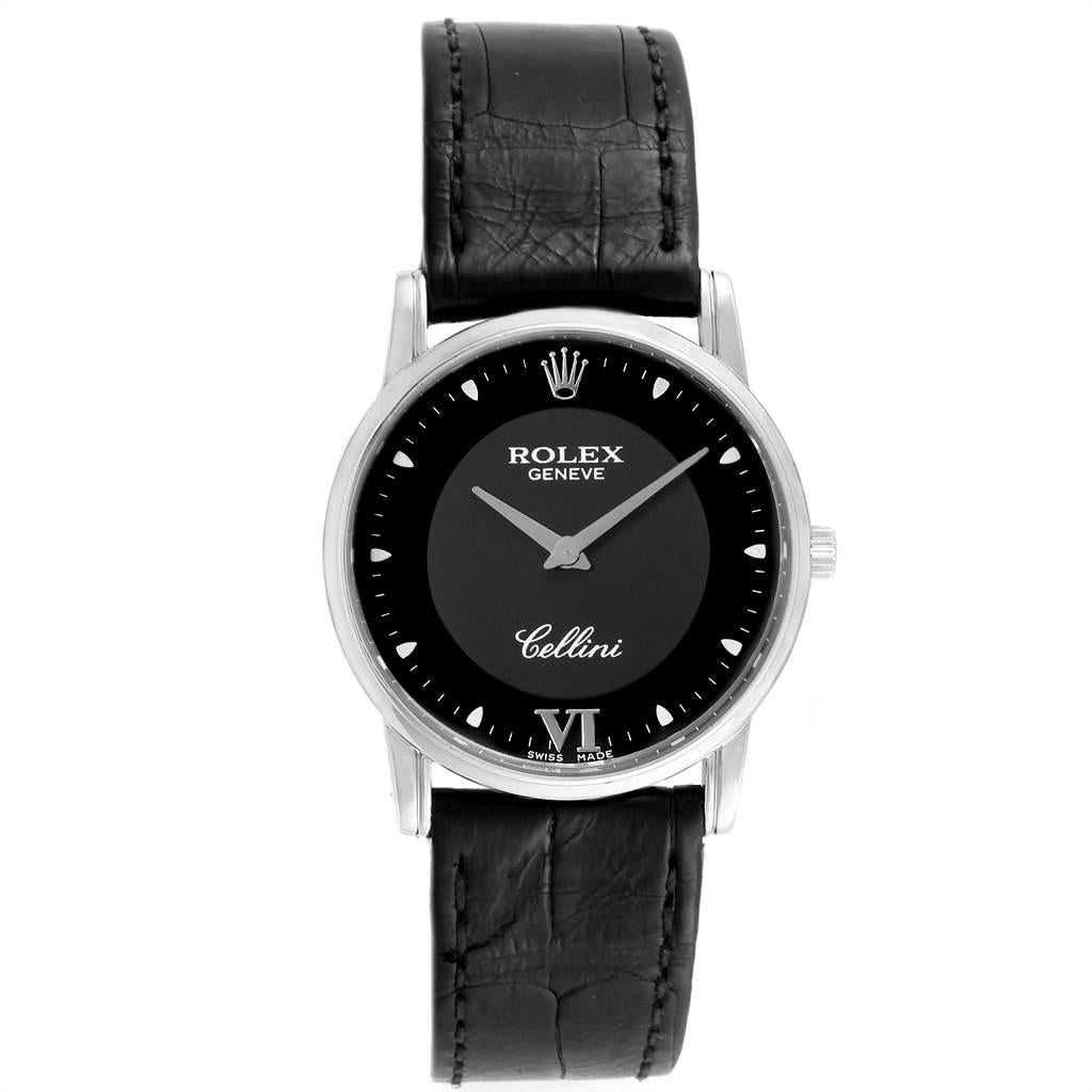Rolex Cellini Classic 18K White Gold Black Dial Mens Watch 5116. Manual winding movement. 18k white gold slim case 31.8 x 5.5 mm in diameter. Rolex logo on a crown. Scratch resistant sapphire crystal. Flat profile. Black dial with white painted hour