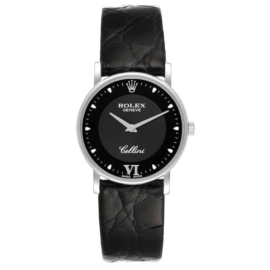 Rolex Cellini Classic 18k White Gold Black Dial Unisex Watch 5115. Manual winding movement. 18K white gold slim case 31.8 x 5.5 mm in diameter. Rolex logo on a crown. . Scratch resistant sapphire crystal. Flat profile. Black dial with dot hour