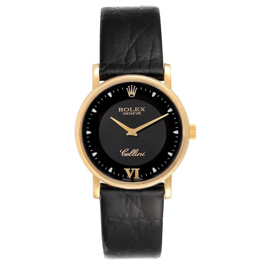 Rolex Cellini Classic 18k Yellow Gold Black Dial Unisex Watch 5115. Manual winding movement. 18K yellow gold slim case 31.8 x 5.5 mm in diameter. Rolex logo on a crown. . Scratch resistant sapphire crystal. Flat profile. Black dial with dot hour