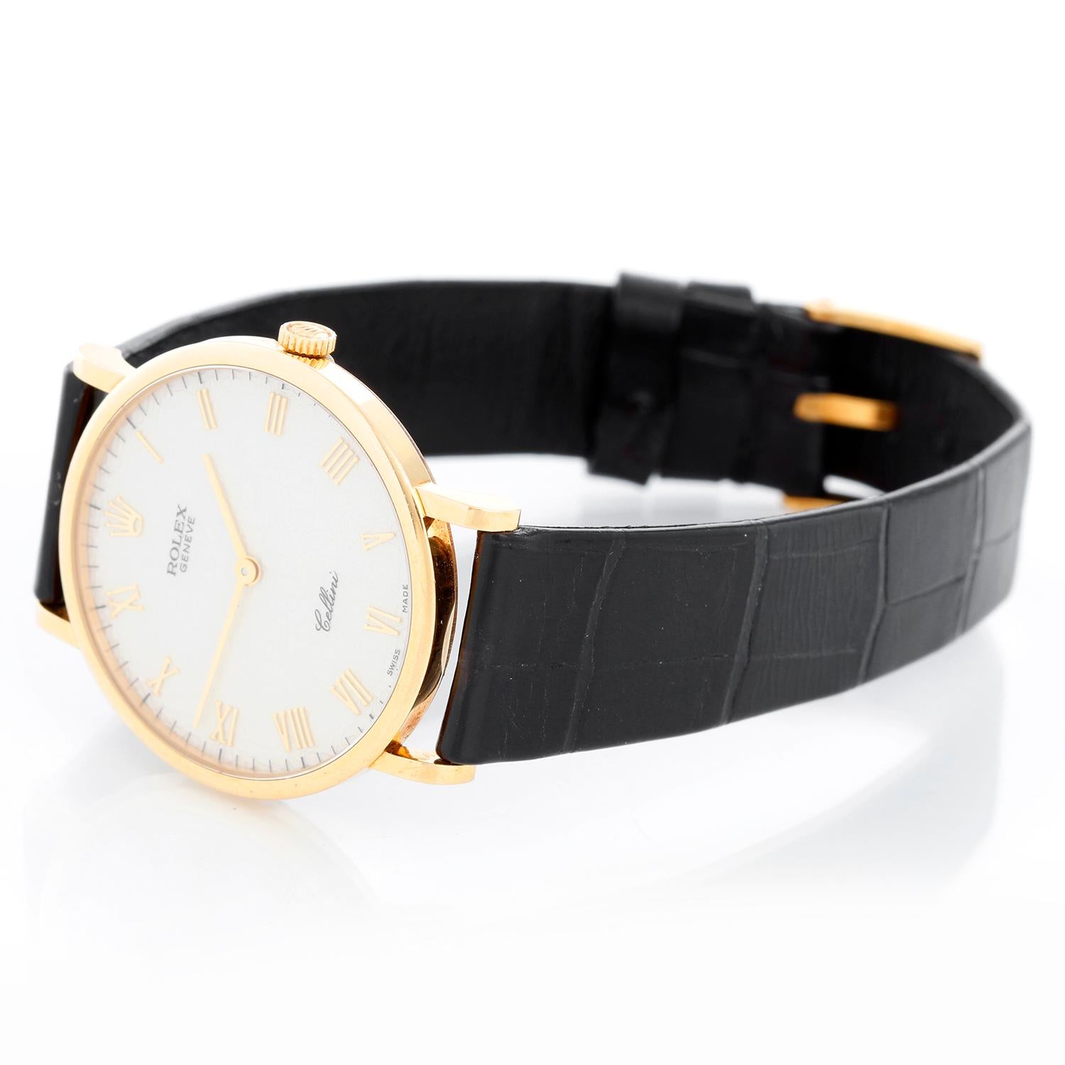 Rolex Cellini Classic 18k Yellow Gold Men's Watch 5112 White Jubilee Roman Dial - Manual winding. 18k yellow gold case (32mm diameter). White Jubilee dial with gold Roman numerals. Strap band with tang buckle. This watch still retains its original