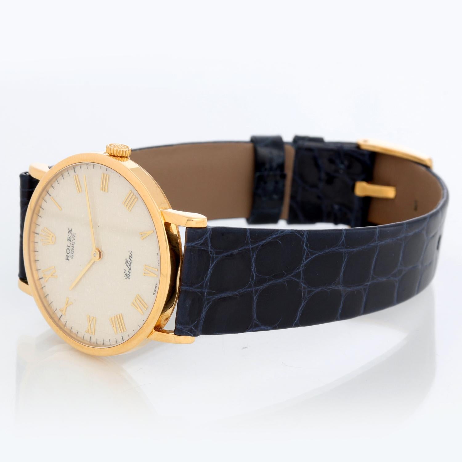 Rolex Cellini Classic 18k Yellow Gold Men's Watch 5112 White Roman Dial - Manual winding. 18k yellow gold case (32mm diameter). White Jubilee dial with gold Roman numerals. Rolex strap with a Rolex tang buckle . Pre-owned with custom box .