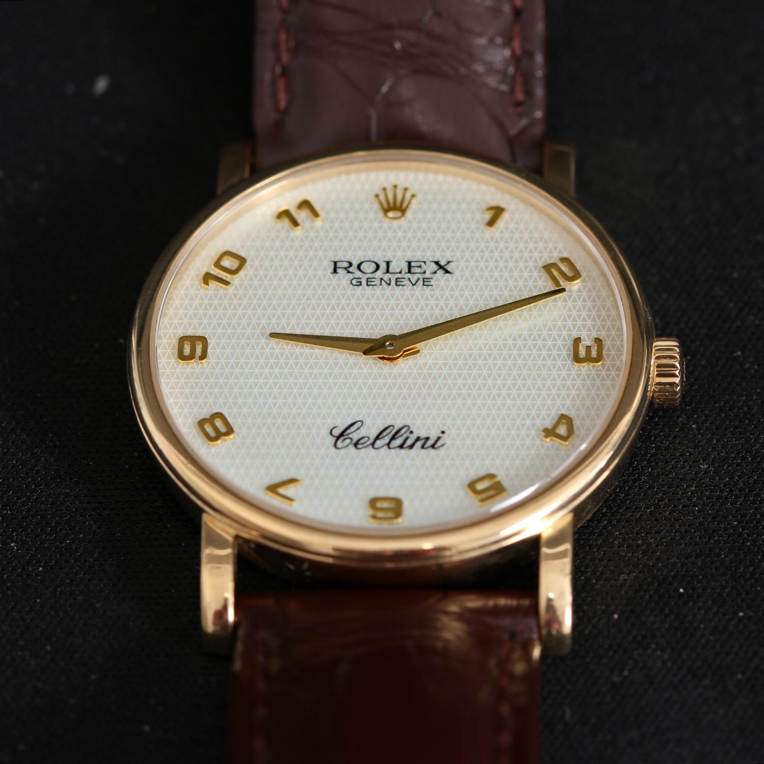 Rolex Cellini Classic 18k Yellow Gold Men's Watch 5115 - Manual winding. 18k yellow gold case (32 mm). Mother of Pearl dial with gold Arabic numerals. Rolex brown leather strap band with Rolex tang buckle. Pre-owned with custom box. 