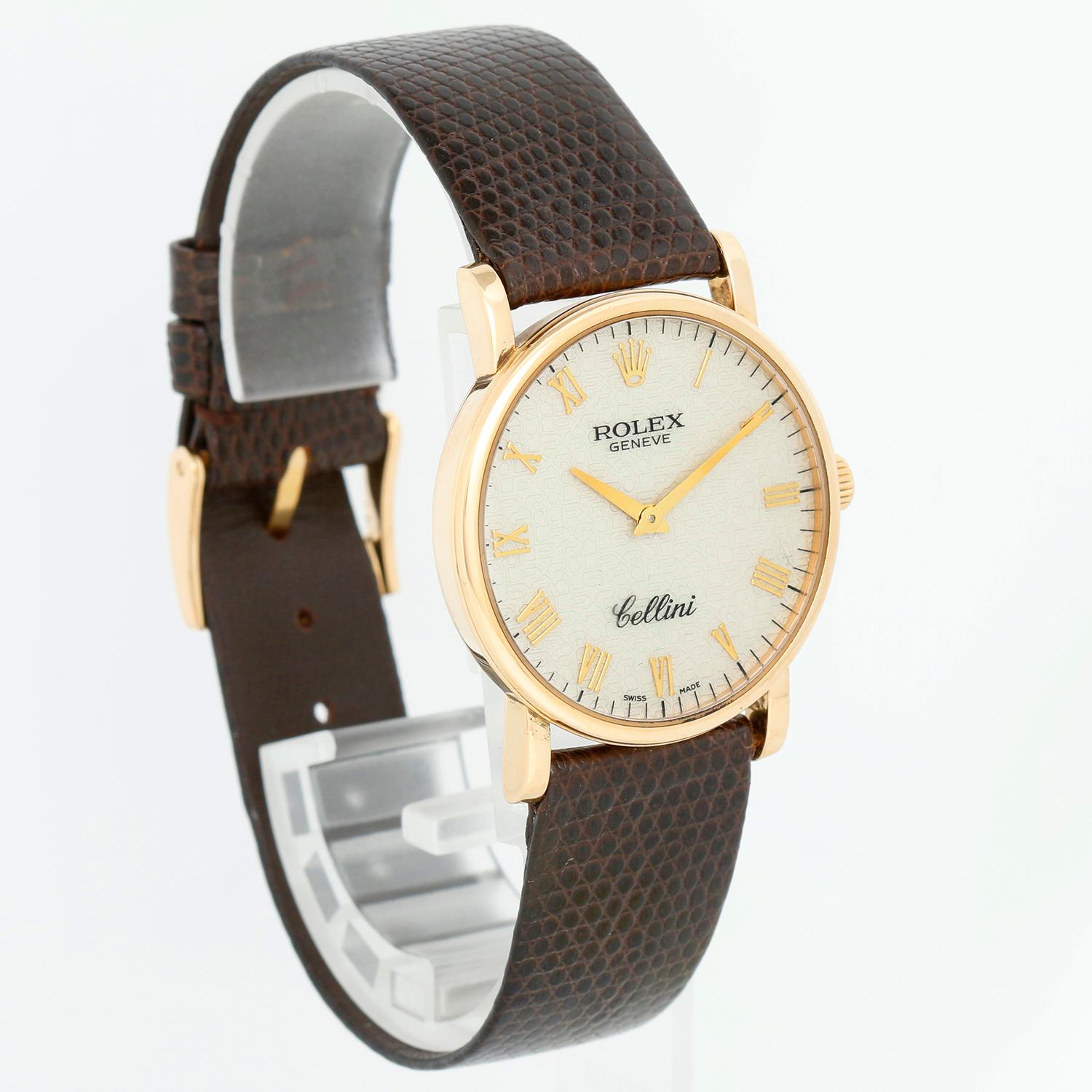 Rolex Cellini Classic 18k Yellow Gold Men's Watch 5115 - Manual winding. 18k yellow gold case (32 mm). Jubilee cream dial with gold Roman numerals. Brown Rolex lizard strap with 18k Rolex tang buckle. Pre-owned with custom box.