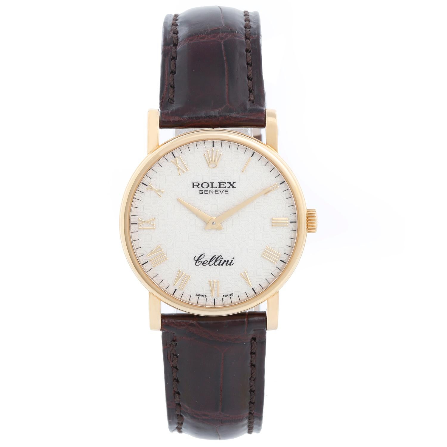 Rolex Cellini Classic 18k Yellow Gold Men's Watch 5115 - Manual winding. 18k yellow gold case (32 mm). Cream jubilee dial with Roman numerals. Brown Rolex strap band with 18k yellow gold Rolex buckle. Pre-owned with custom box.